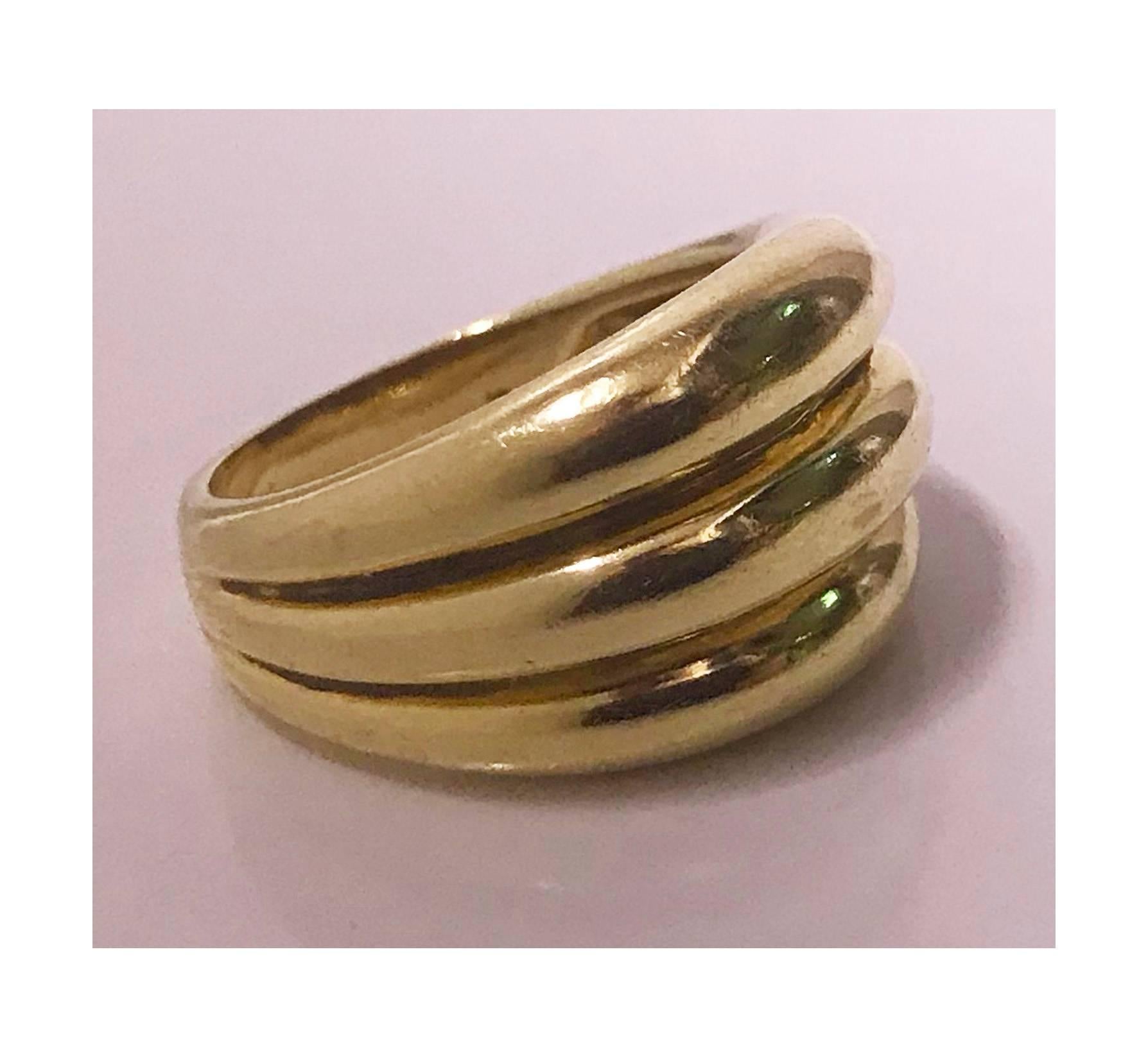 French 18K Ring, C.1970. The large band of triple ribbed design, plain shank. Stamped with French eagle mark and maker’s mark in lozenge B?. Width of top : 14.75 mm. Item Weight: 11.24 grams. Size: 8.5