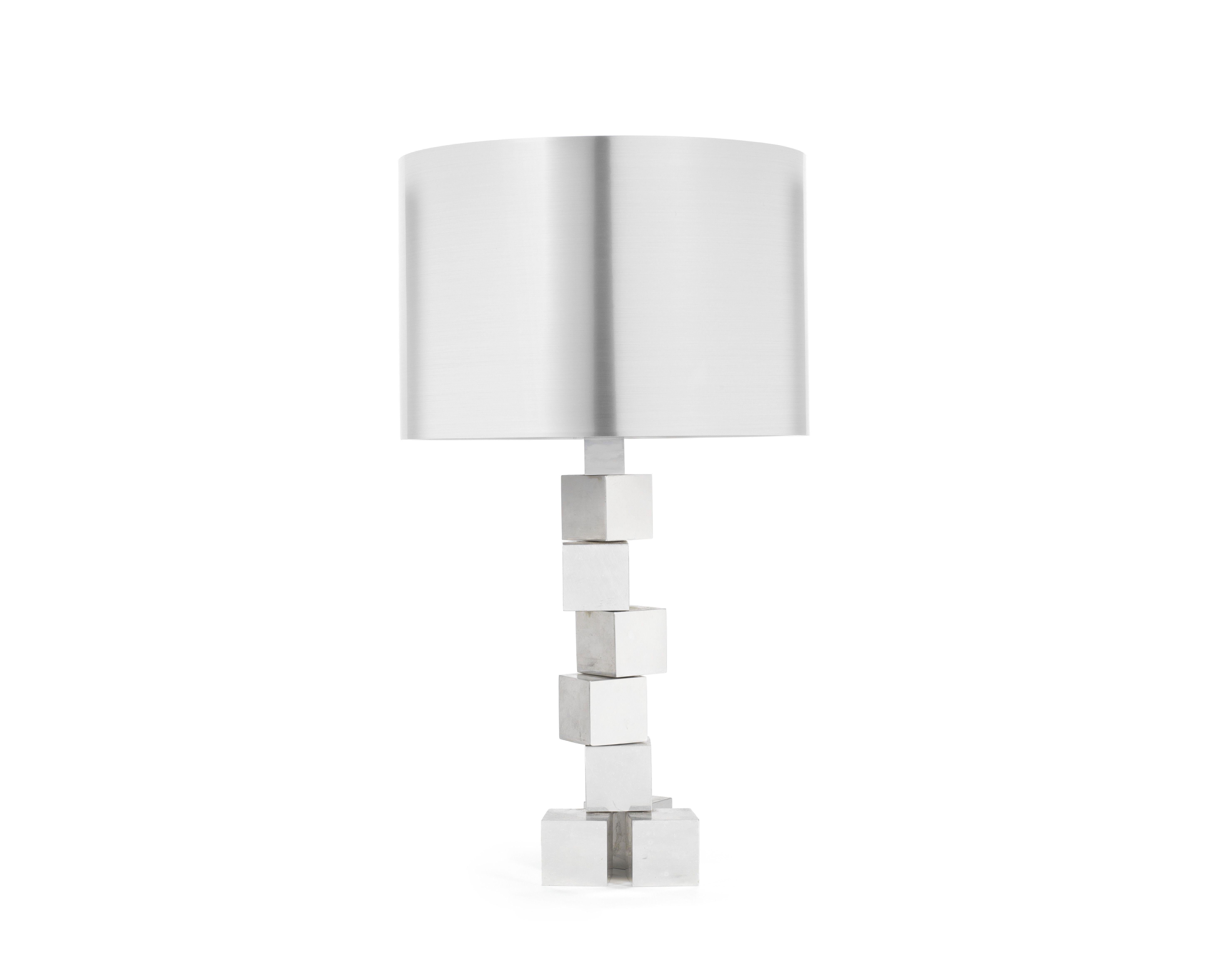 The lamp of chromed metal, the five upper cubes being adjustable and can partially rotate depending on preference, with a European plug fitting.
Each foot stamped 'RJ' underneath, height including shade 43cm.

 