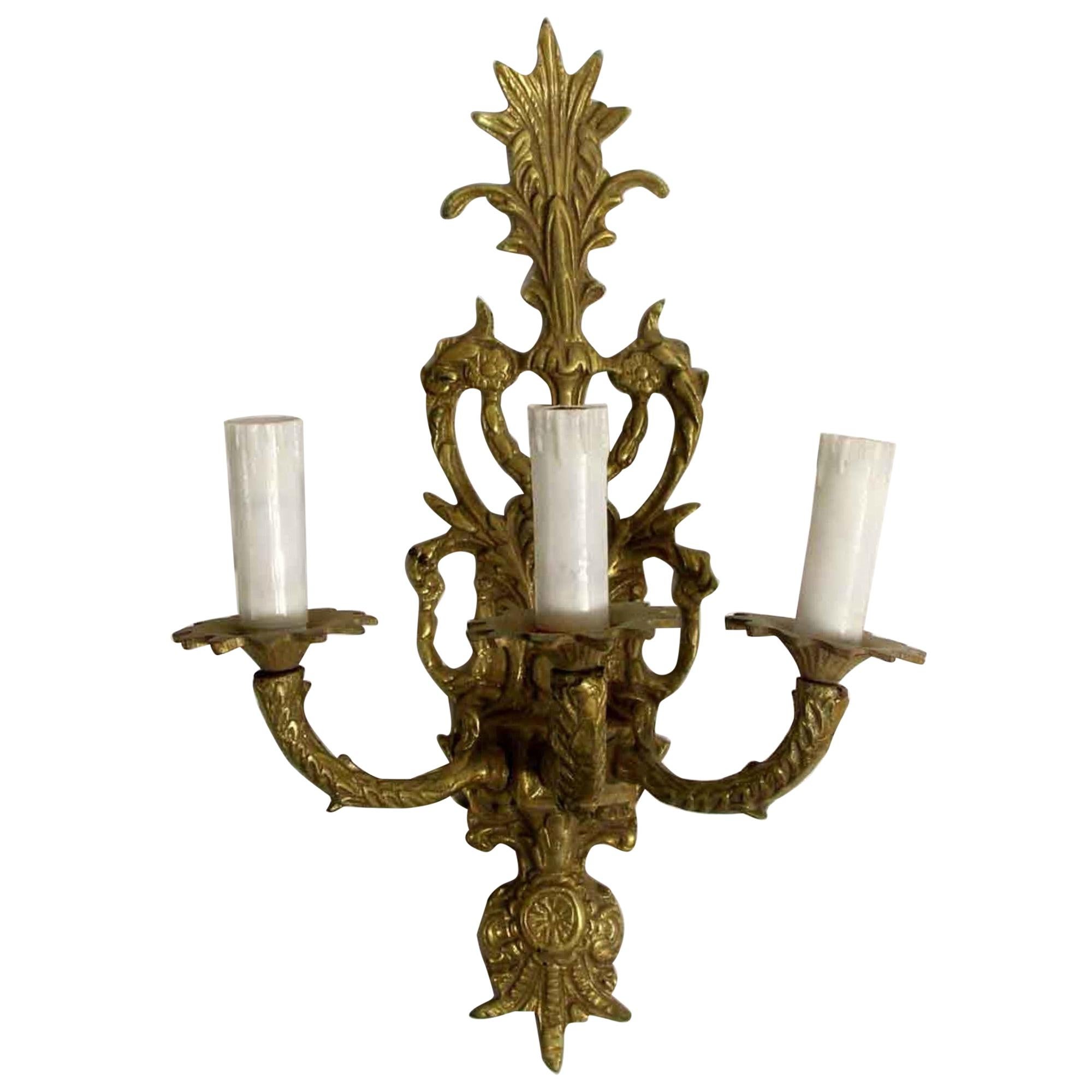 1970s cast brass 3 arm sconces with foliage detail. French style. Priced as a pair. Please note, this item is located in our Los Angeles, CA location.