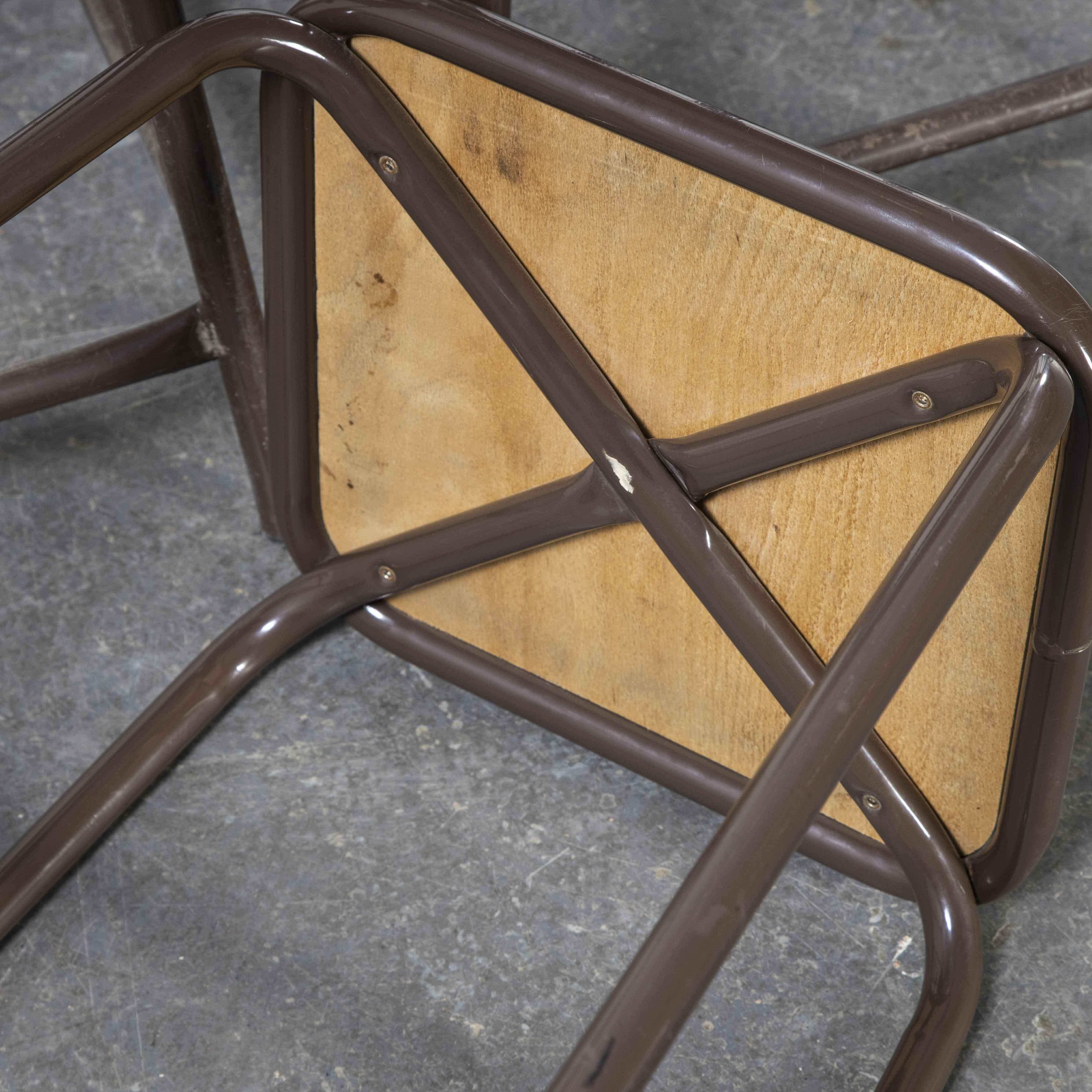 1970s French chocolate brown laboratory stools – set of seven

1970s French chocolate brown laboratory stools – set of seven. Good honest lab stools, heavy steel frames with solid heavy birch ply seats. We clean them and check all fixings, they