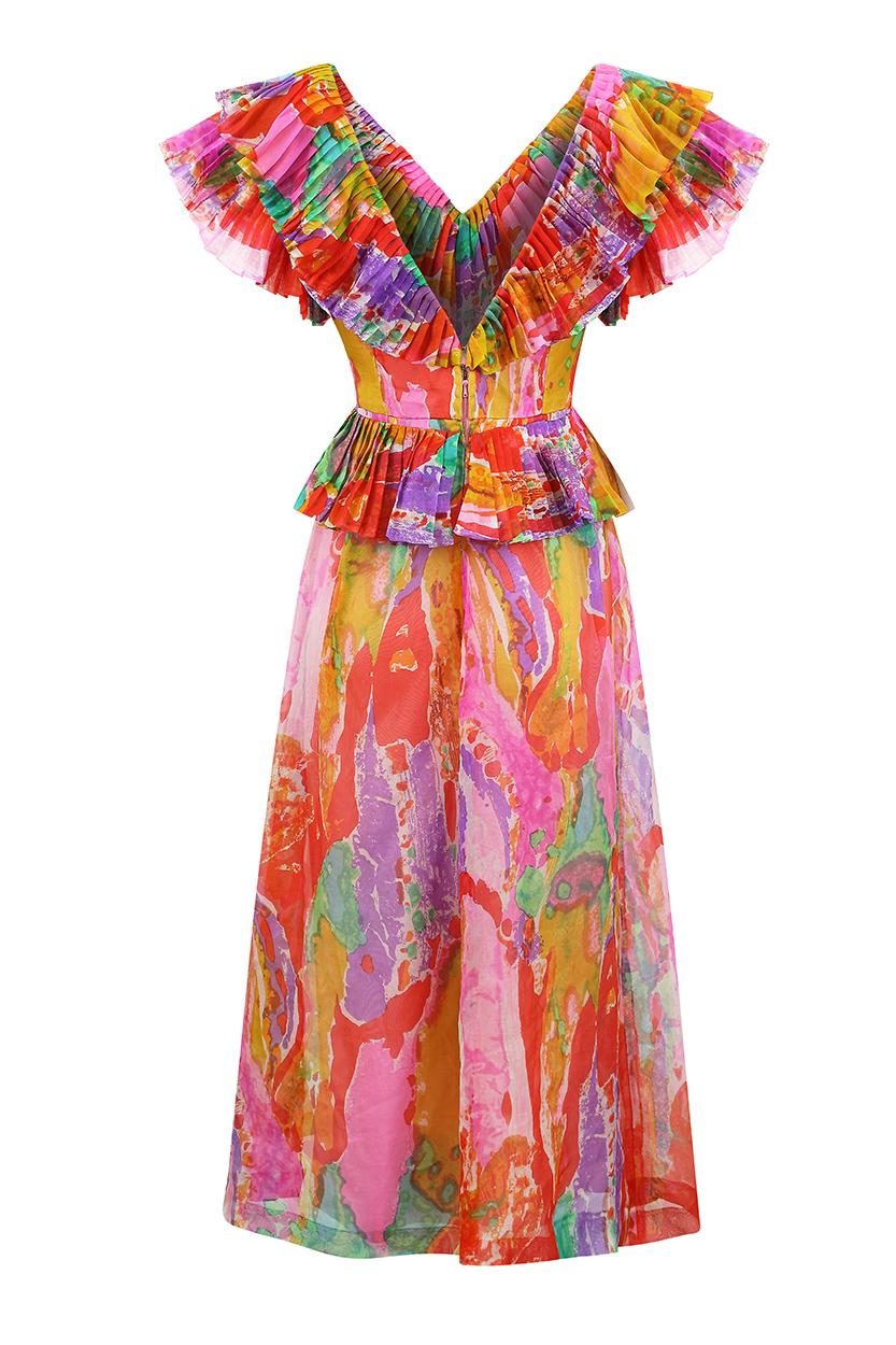 This spectacular 1970s pleated silk chiffon couture dress is in excellent vintage condition and has beautiful construction, hand finished in places. The printed chiffon overlay is an explosion of colour in vibrant vermillion, fuchsia, violet, ochre