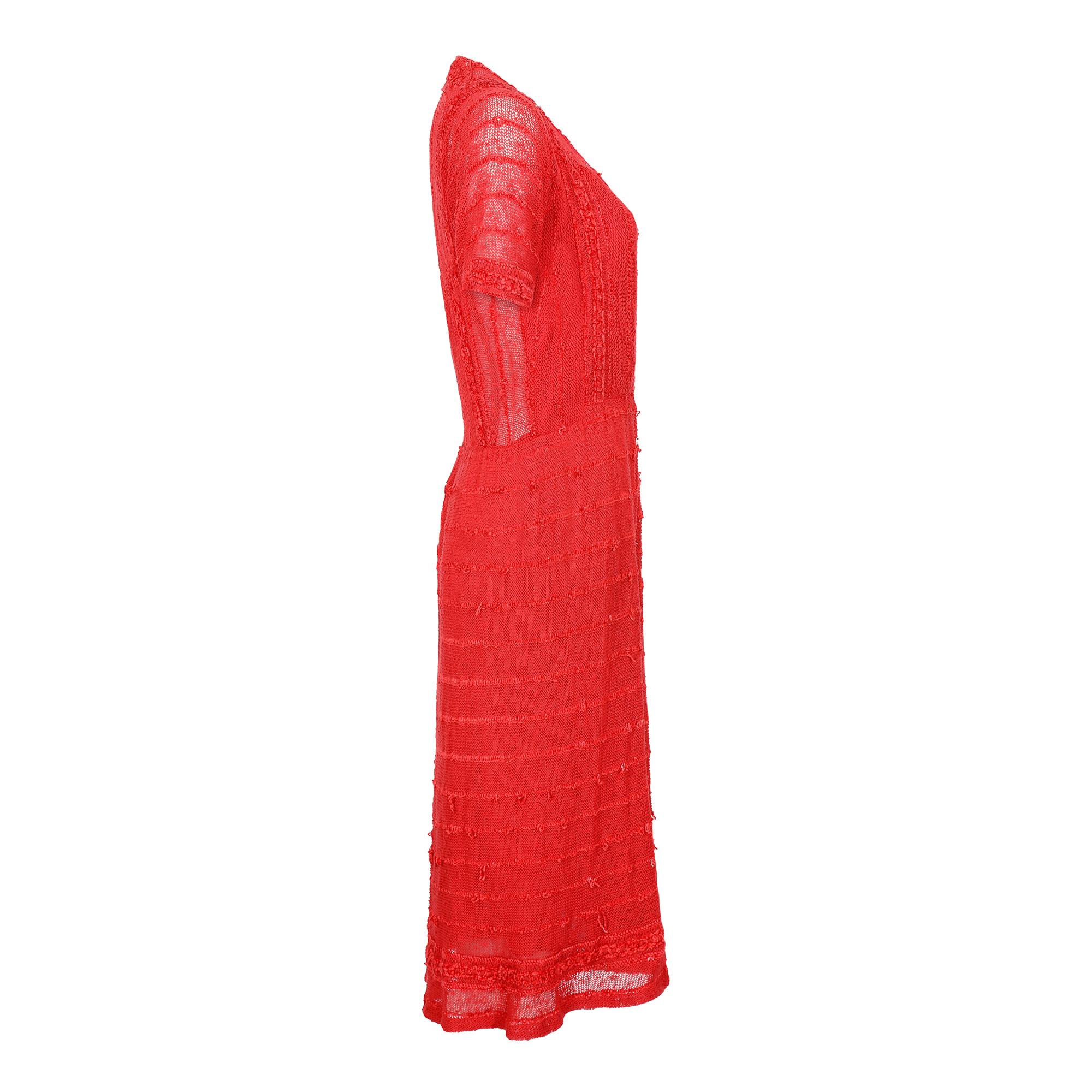 1970s bright red cotton crotchet and chenille knit dress labelled Chaumiere aux Tricots Paris and Made in France.  The dress is waisted and made of wide rows of horizontal and vertical bands interspersed with a single row of chenille velvet to add