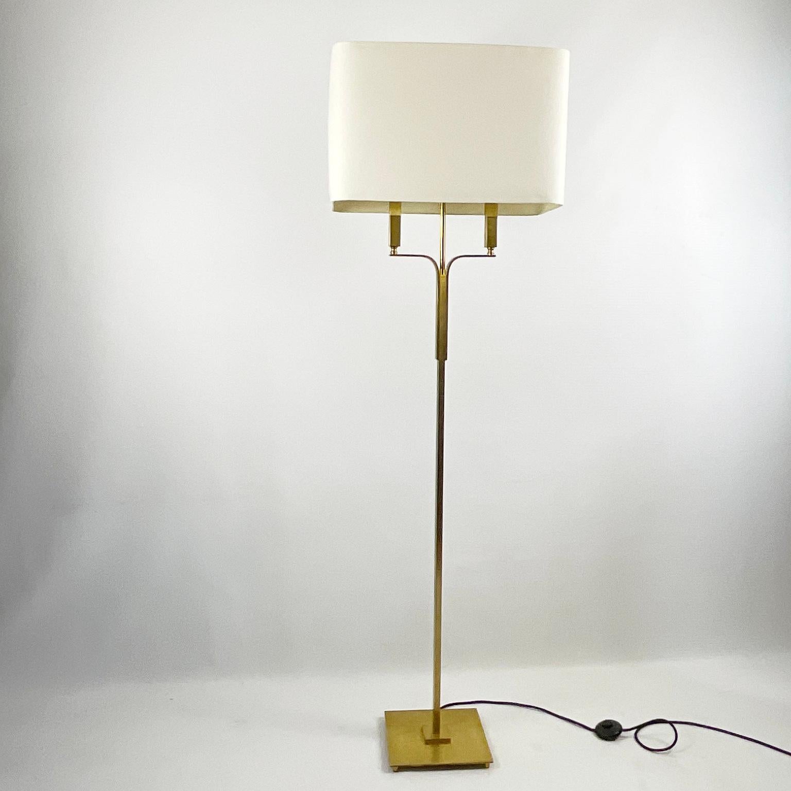 Floor lamp in brushed brass from the 70s in a manner of Maison Charles or Perzel, with two bulbs covered with a rectangular lampshade. Completely rewired with an in-line footswitch.
