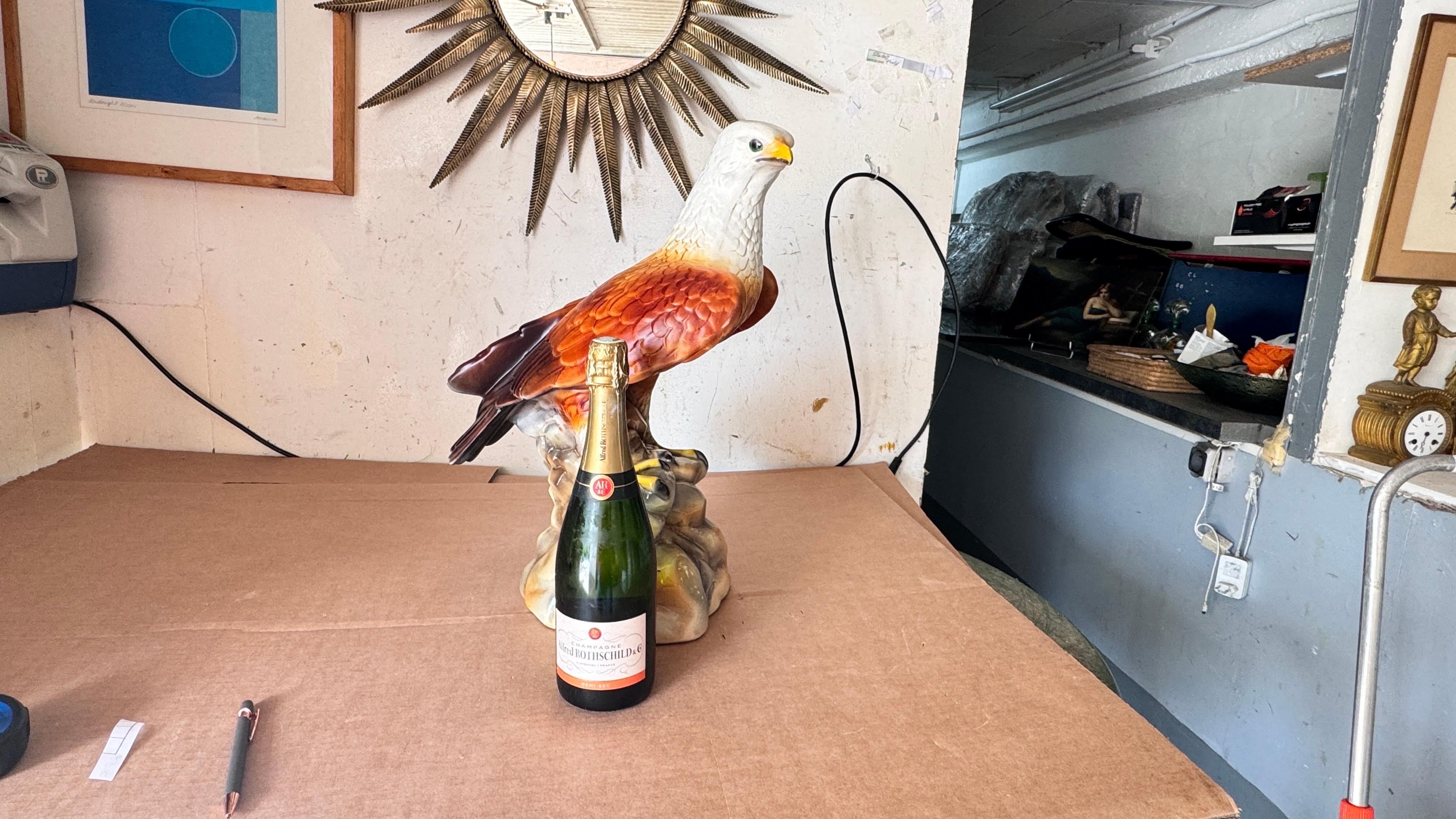 1970s French Hand-Painted Ceramic Eagle Sculpture, Realistic Large-Scale Decor

Description:
This striking ceramic eagle sculpture, crafted and hand-painted in France during the 1970s, captures the raw power and majesty of the bird of prey with