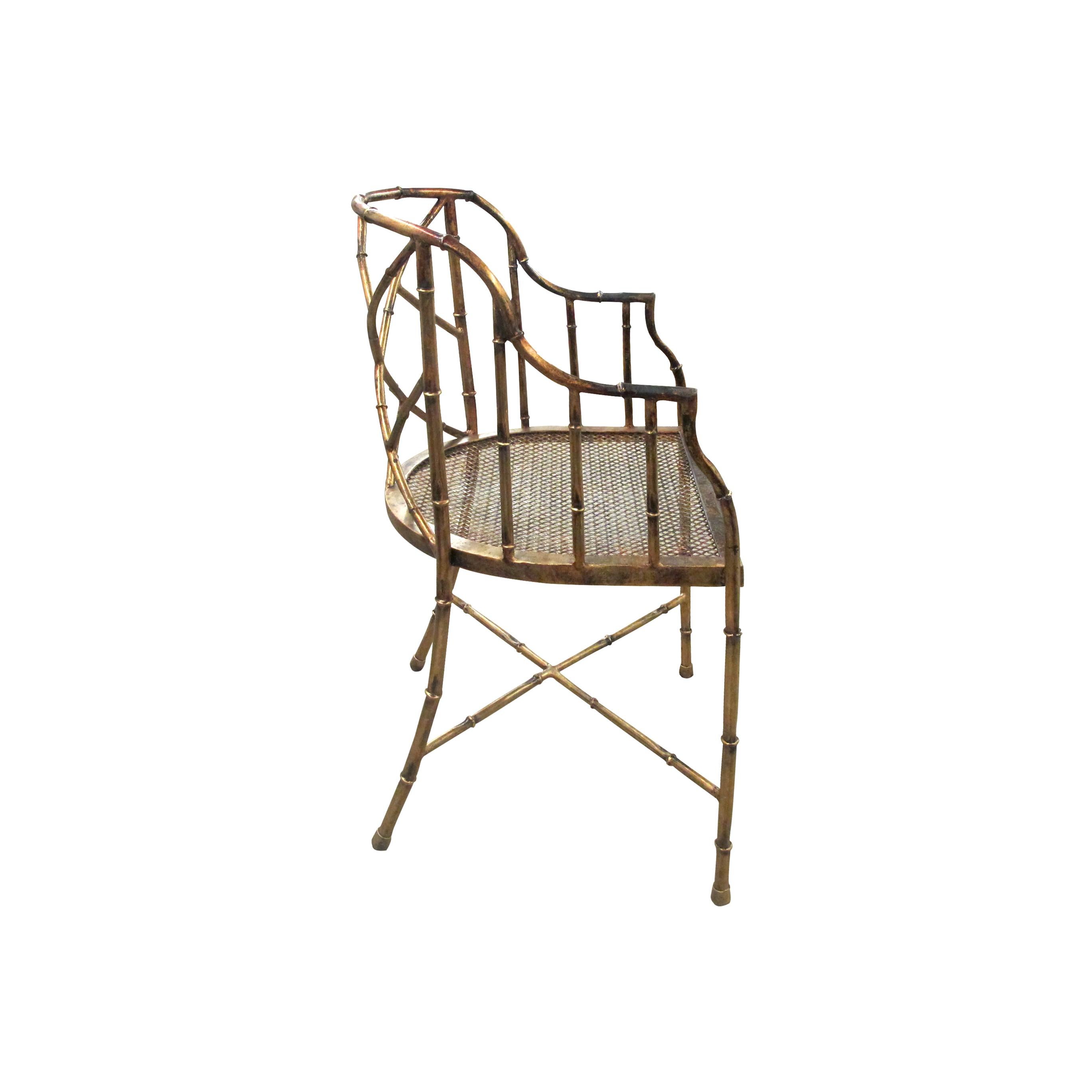 A 1970s Hollywood Regency faux bamboo bronzed metal occasional armchair with a simple and stylish organic design in the style of Jacques Adnet and Jean Royere. 

Size: H 82 cm x W 52 cm x D 45 cm
Seat height 45 cm.

  