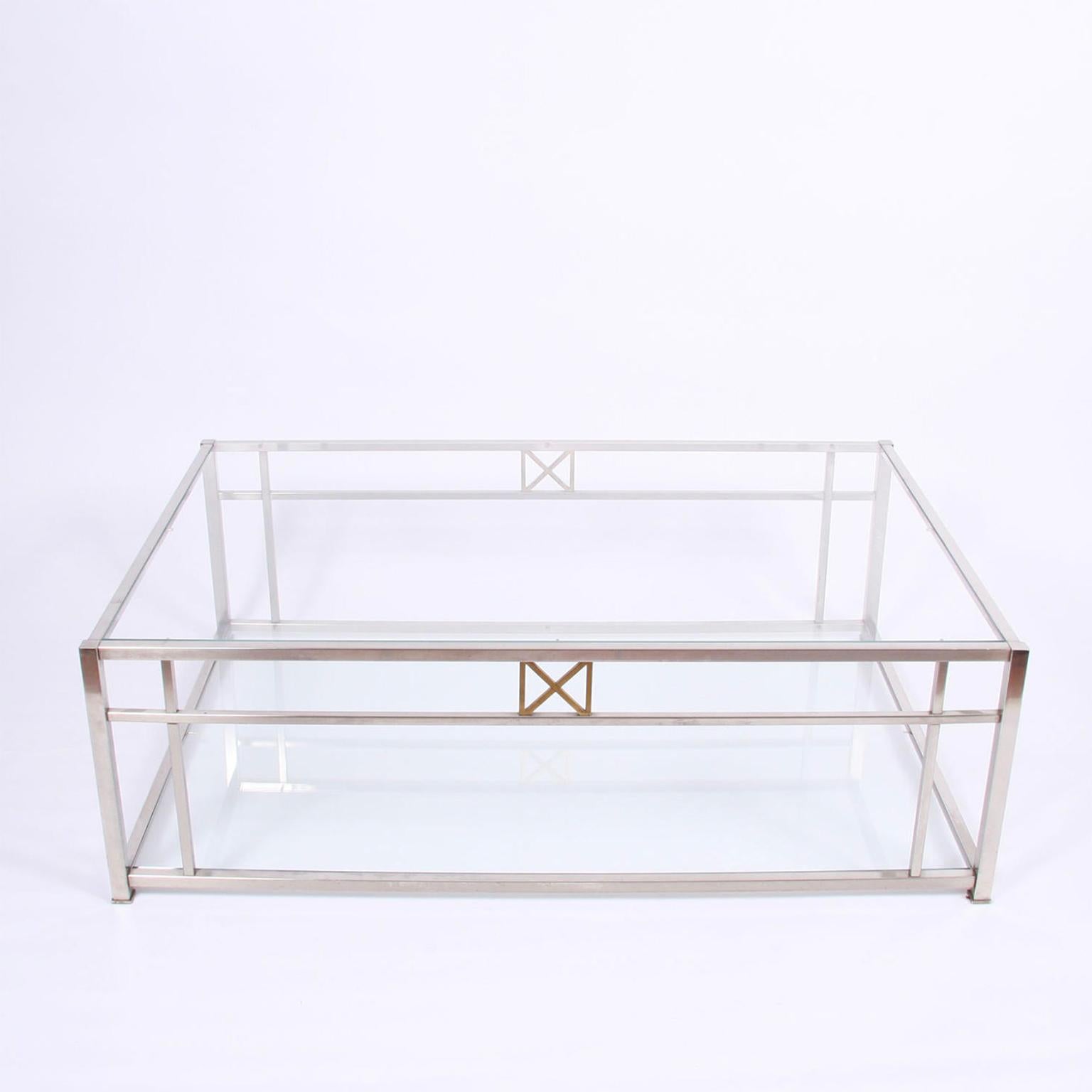 French circa 1970

A chic, large, glass and chrome two tier coffee table with cross design.
