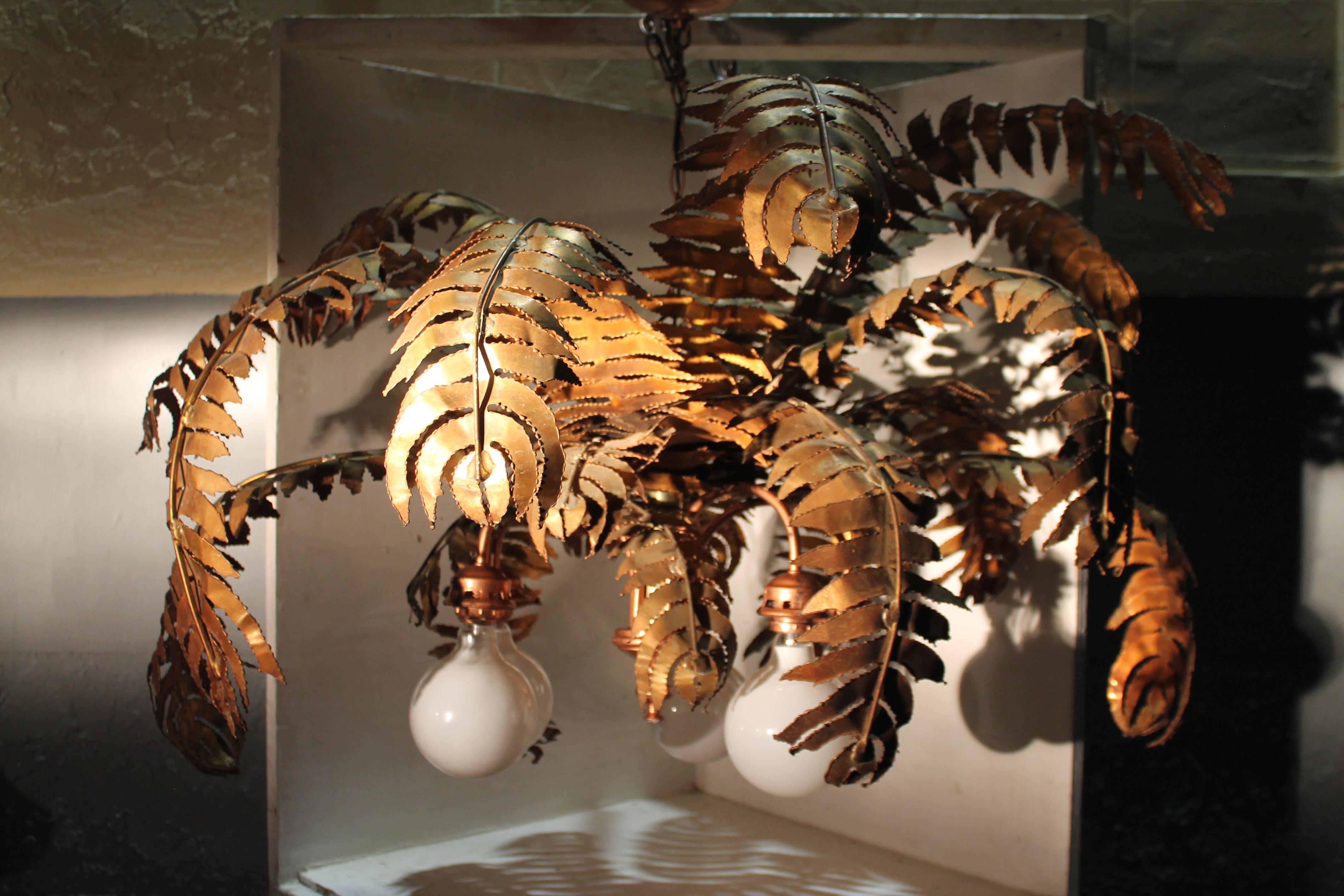 Spectacular and Very Rare. 1970's French Mid Century Modern Brutalist Cut Brass Palm Tree Chandelier. Large statement piece acquired from the Club Castell in Paris. Please look closely at pictures as they tell the story of this quite unique