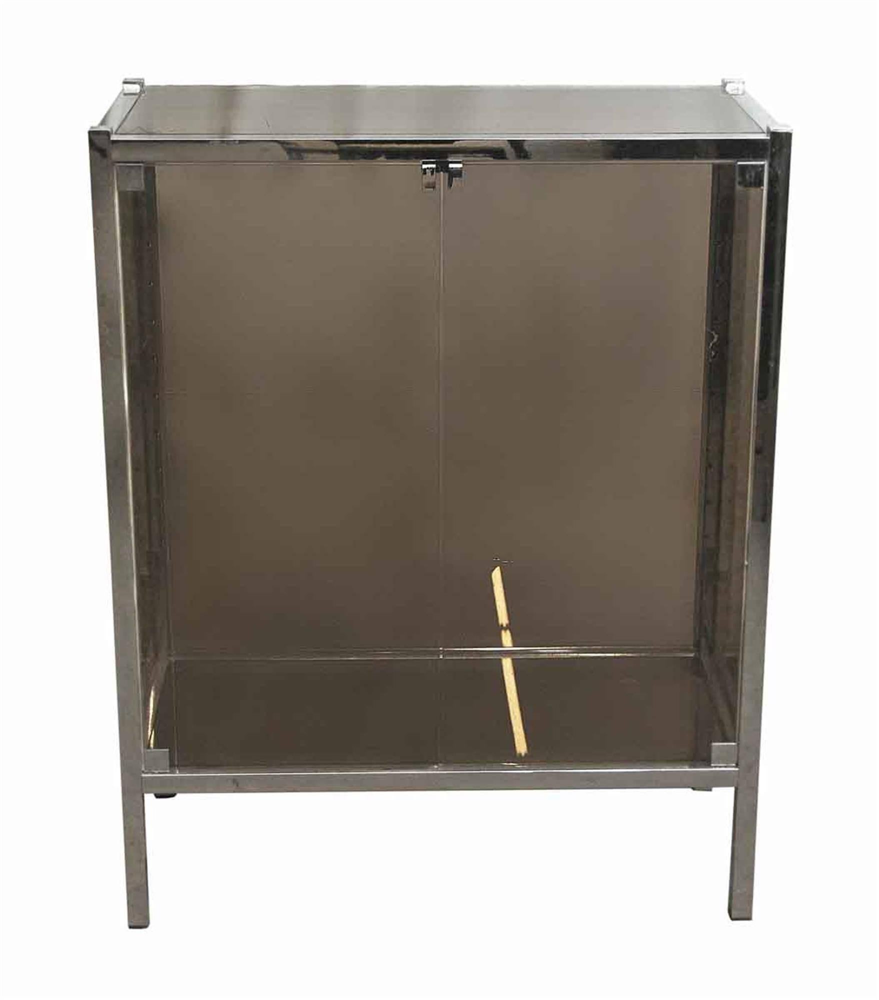 Mid-Century Modern French chrome display case with smoked colored glass, circa 1970s. This can be seen at our 400 Gilligan St location in Scranton, PA.