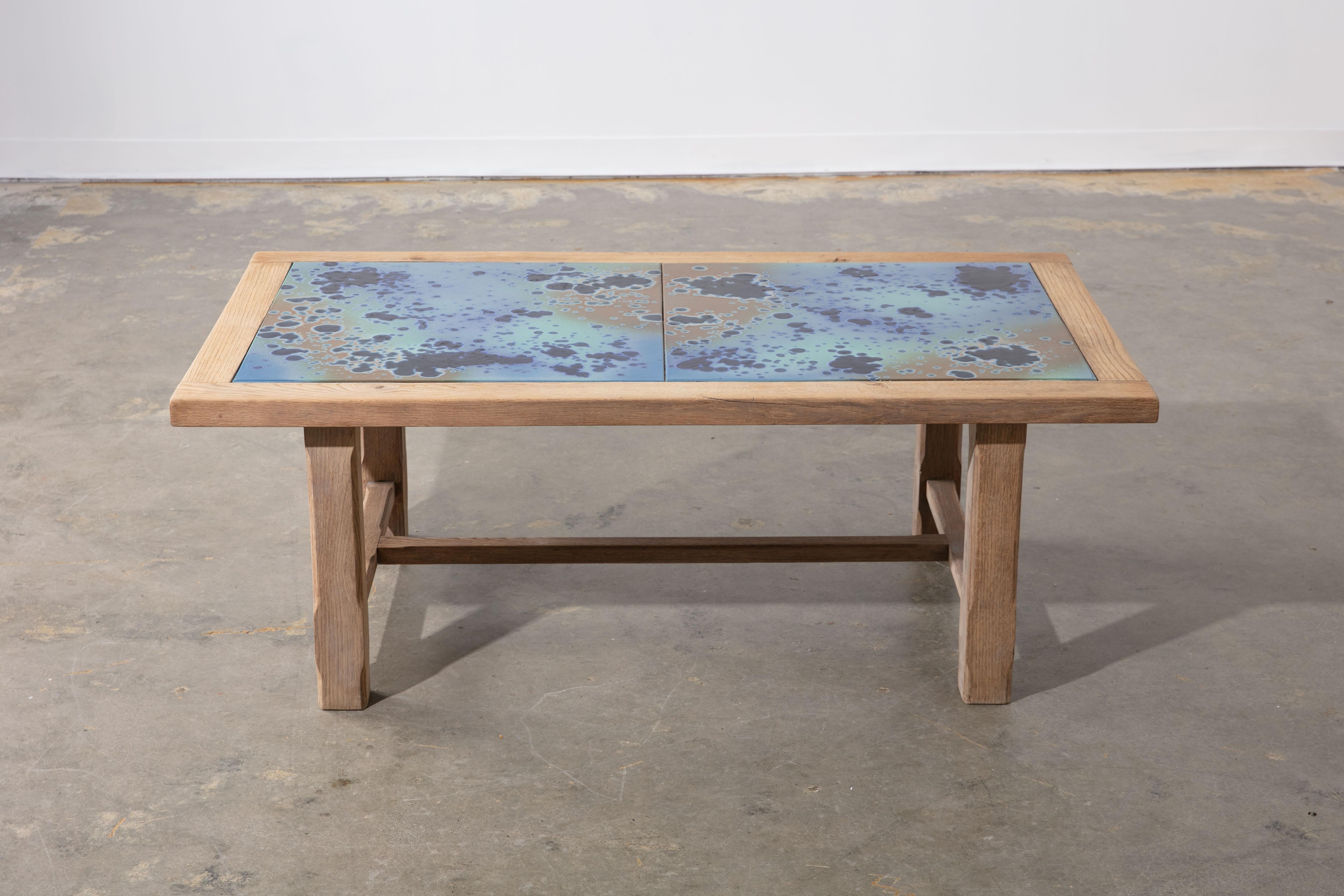 Beautiful French natural oak tile top coffee table with solid base in shades of blue with 