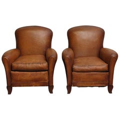 1970s French Pair of Leather Club Chairs with a Studded Back