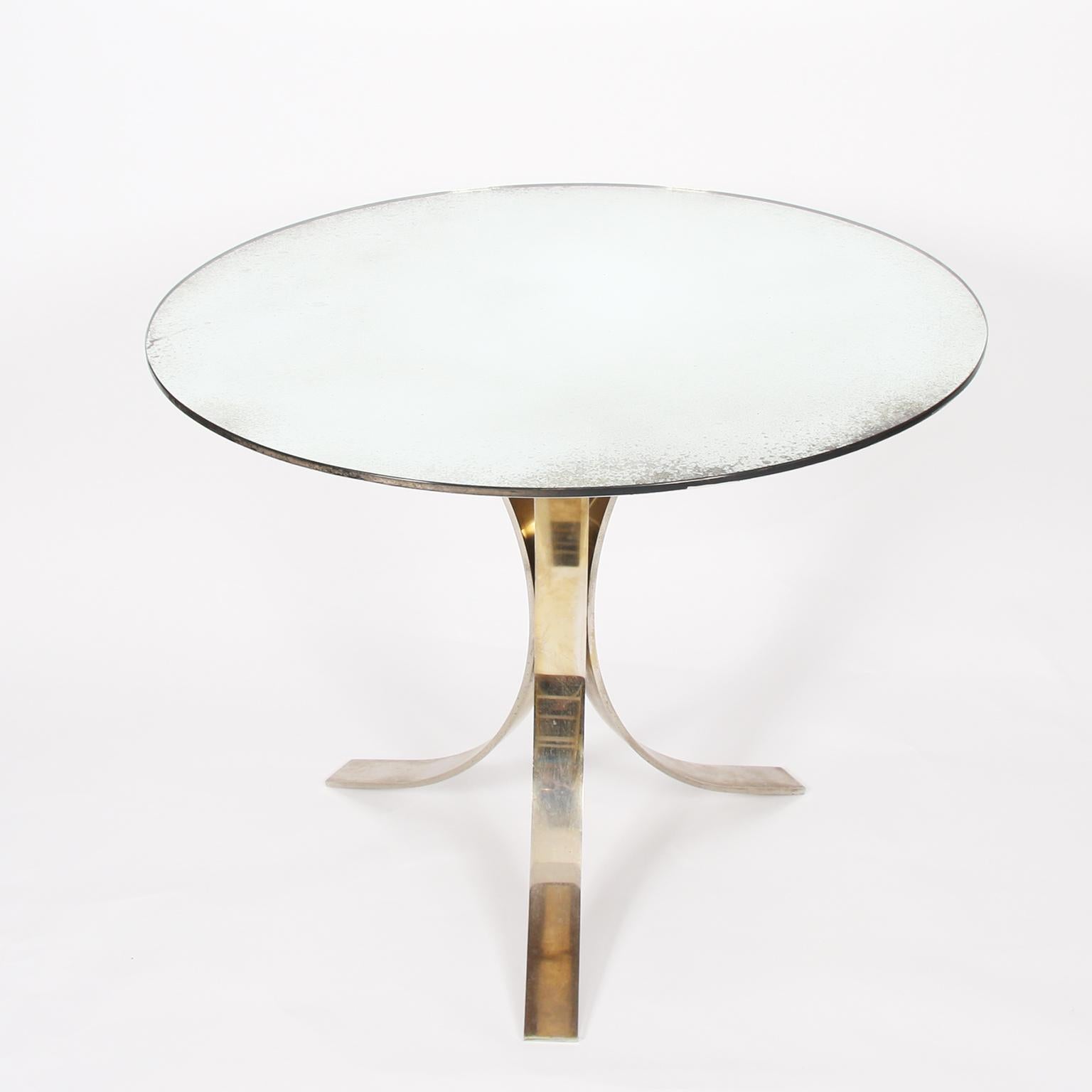 French, 1970s

A beautiful, mirrored glass, centre table on three mirrored legs. 

Lovely patina to the glass.