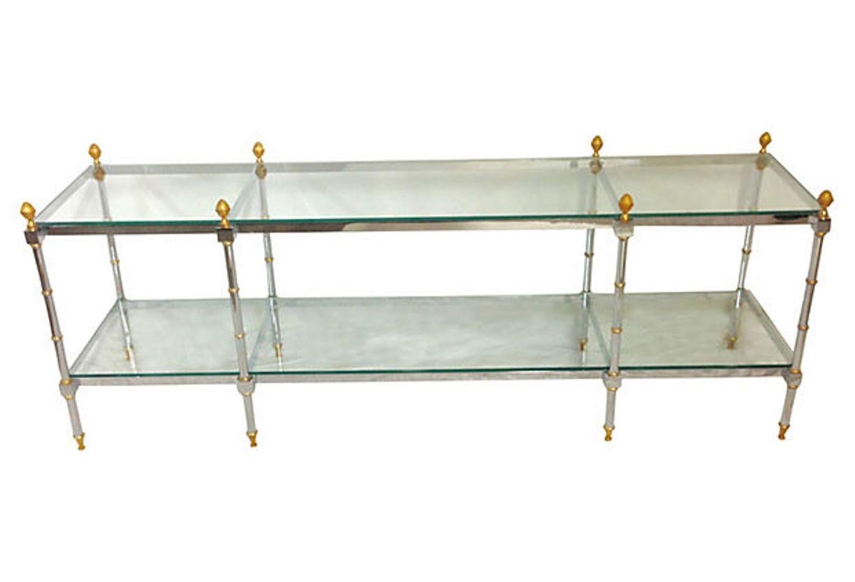 1970'S French polished steel chrome and gilt brass two-tier glass top table attributed to Maison Jansen. This Maison Jansen style finely crafted 71' inch long and rectangular multi purpose table can be used as a sofa, hall, console or display style