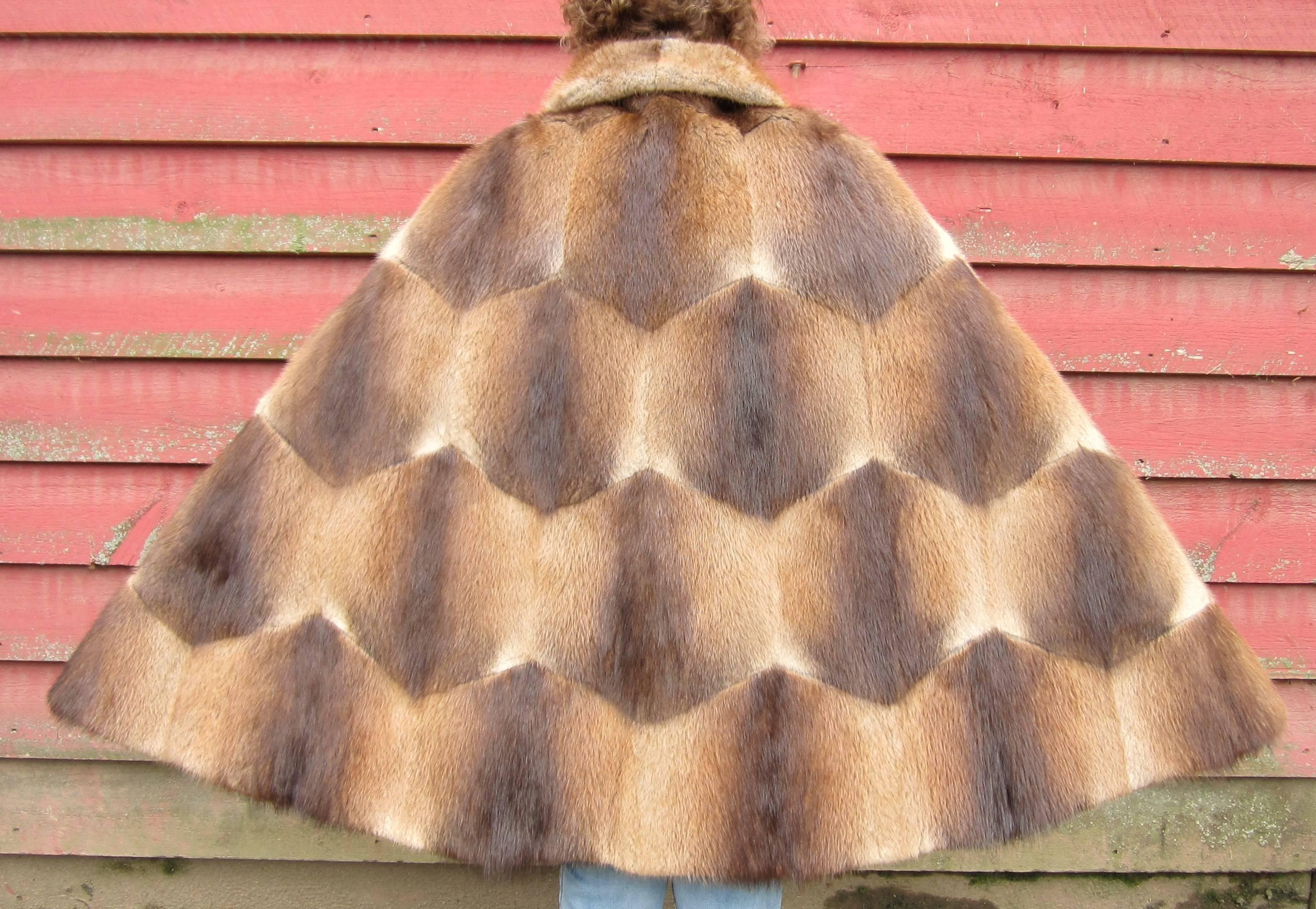 Sheared beaver cape --Fur is soft and supple. Lovely embroidered lining. Slits on both sides for your arms. Monogrammed Will fit a size 10-16 - 37 inches long.  Please be sure to check our storefront for more furs from Mink, Fitch, Fox and Lamb. We