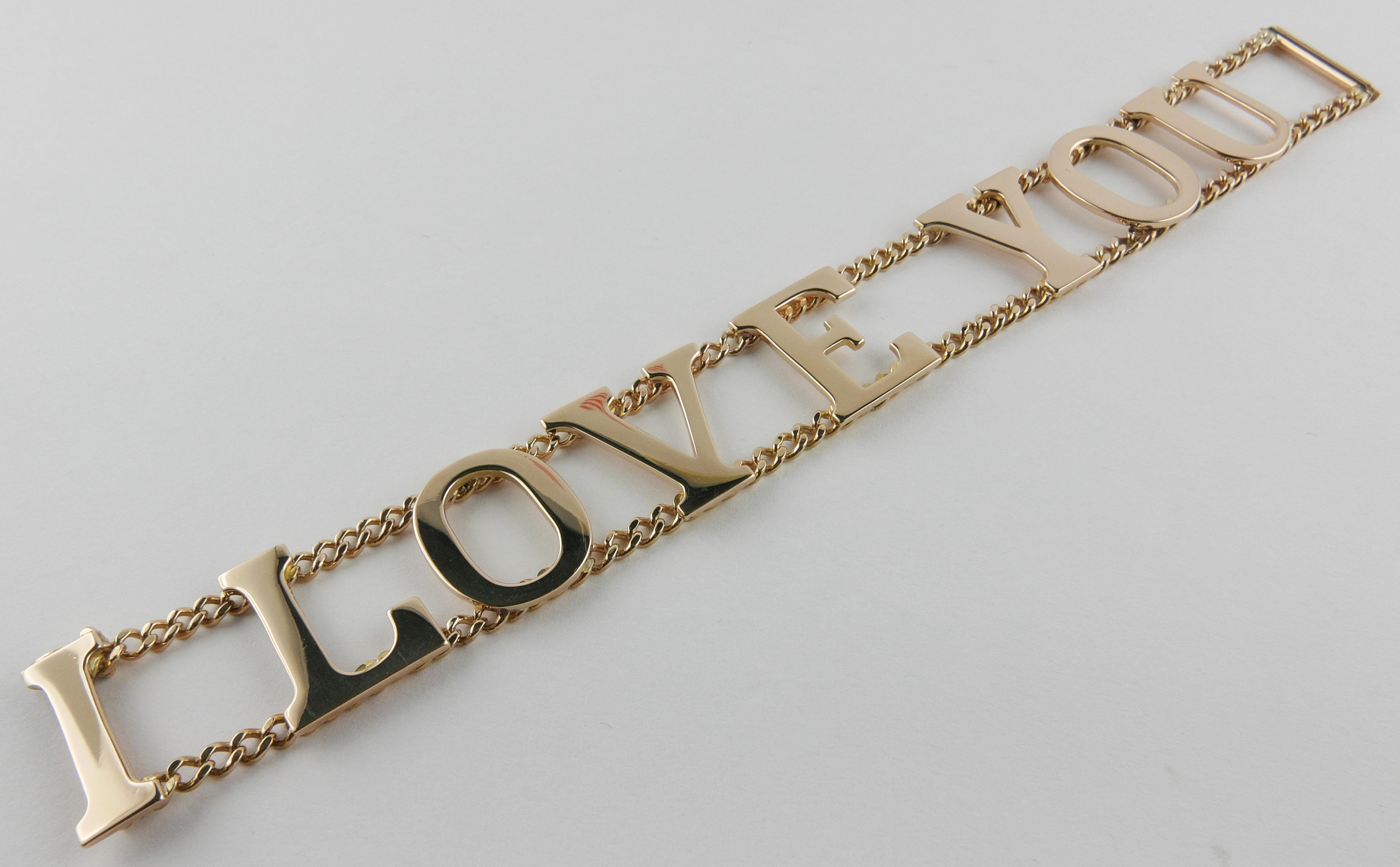 Italian Bracelet crafted with outstanding workmanship in the 1970s by the renowned roman jeweler Fürst, it is formed of a double gourmette chain in Yellow Gold and elements in the shape of letters aimed at composing the words 