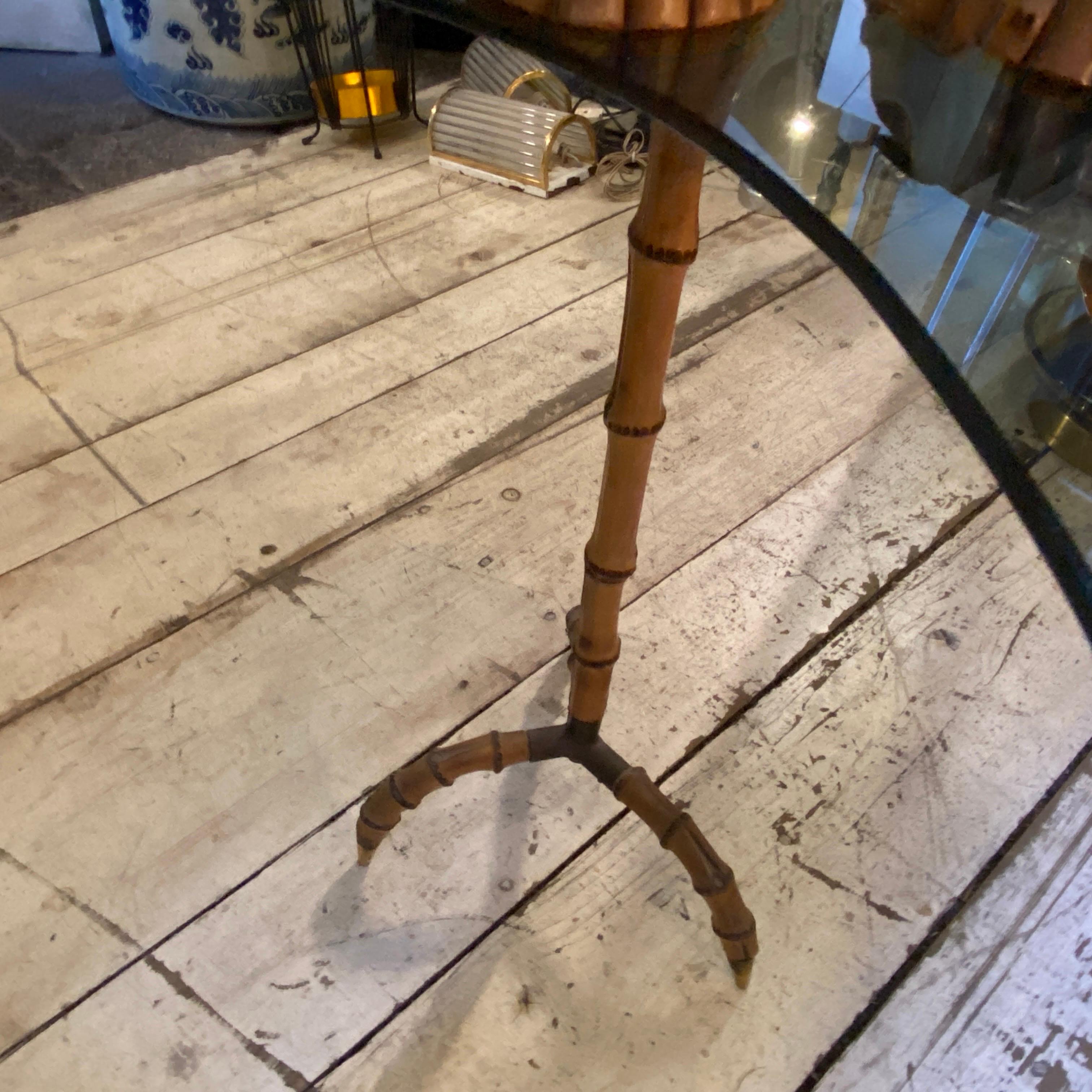 An amazing smoking table with smoking set designed and manufactured in Italy in the style of Gabriella Crespi, brass it's in original patina, bamboo it's in good conditions. Smoking set it's composed by three pieces, the glass it has a particular