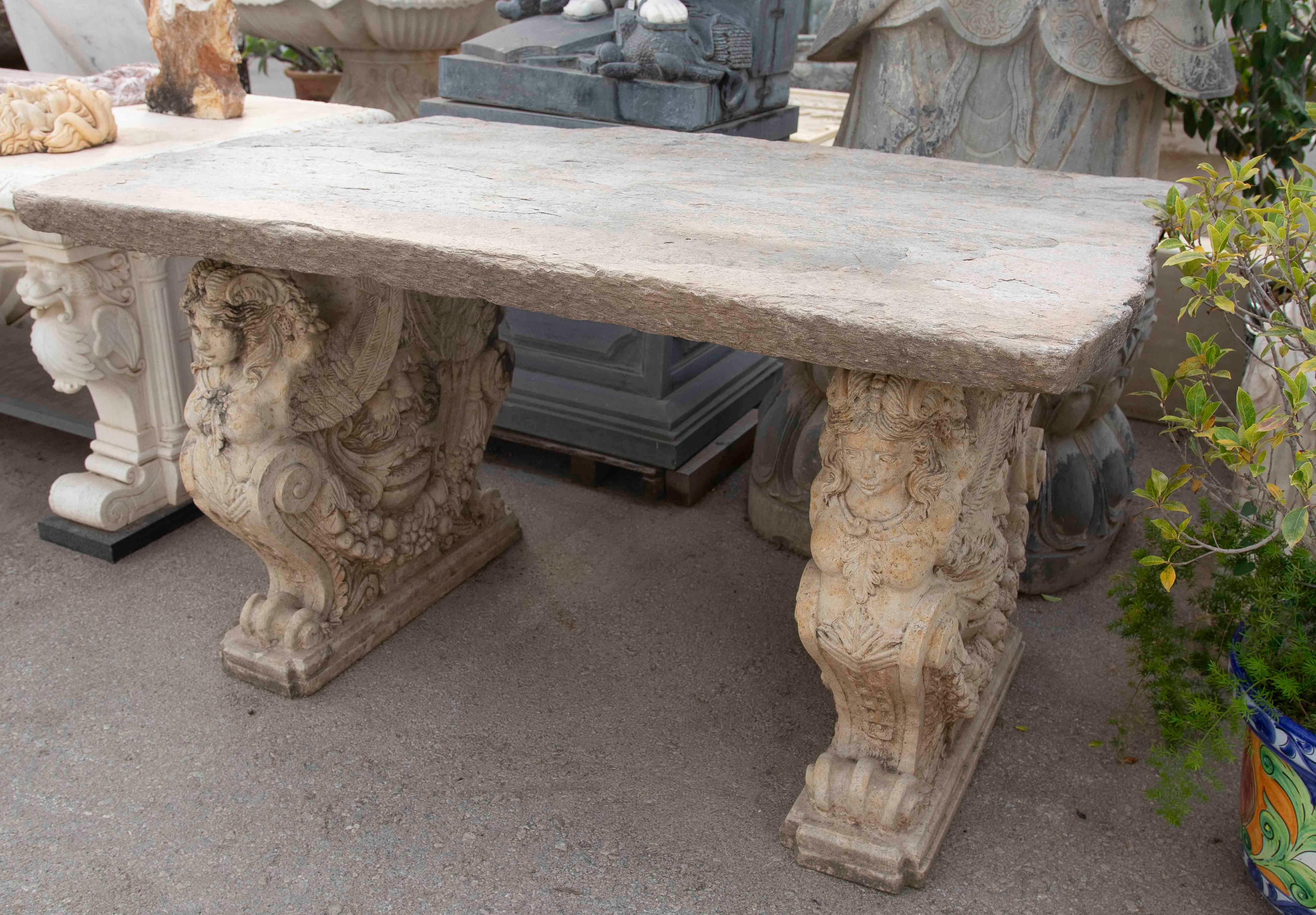 20th Century 1970s Garden Table with Antique Stone Top and Carved Feet For Sale