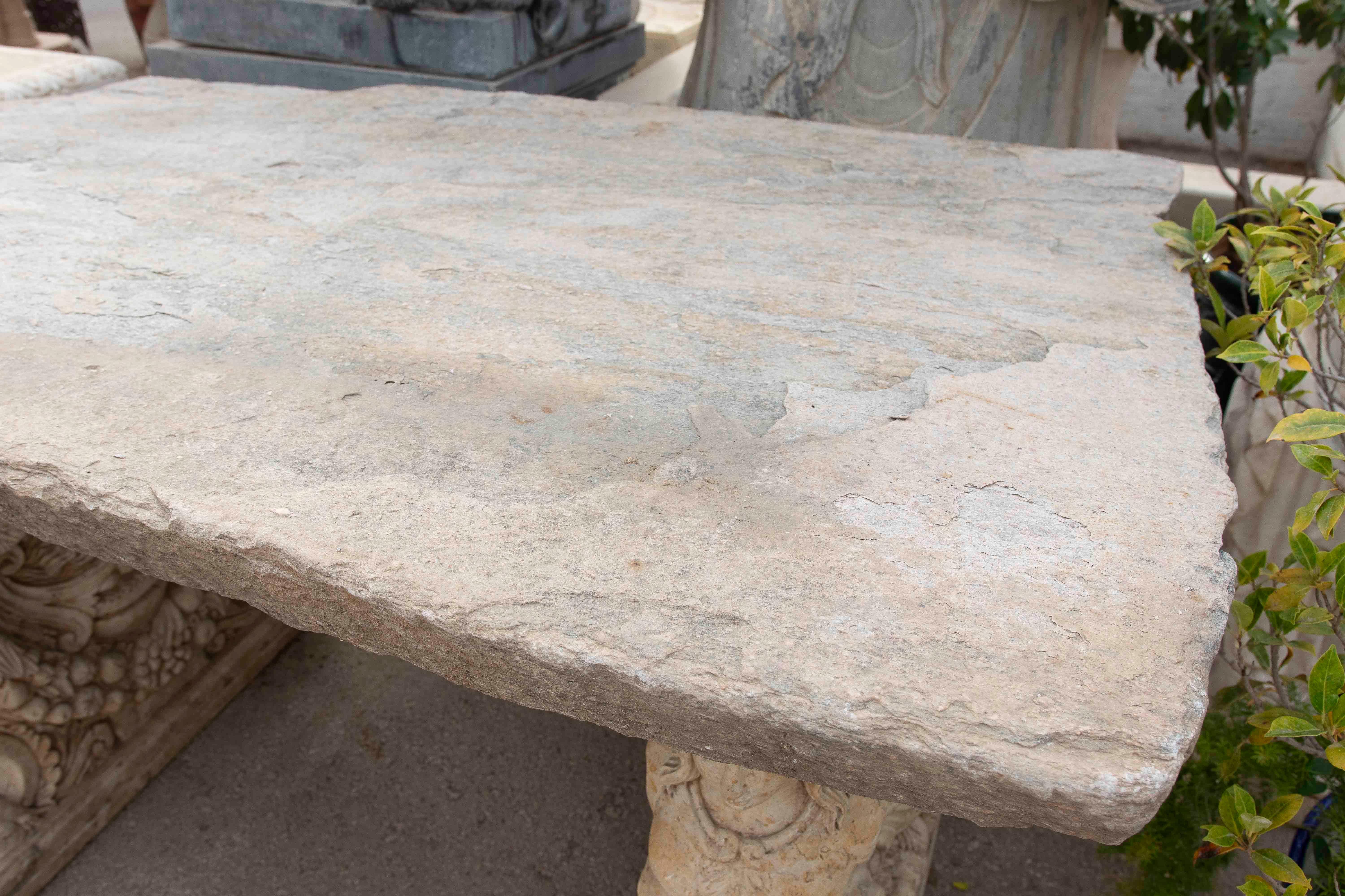 1970s Garden Table with Antique Stone Top and Carved Feet For Sale 1