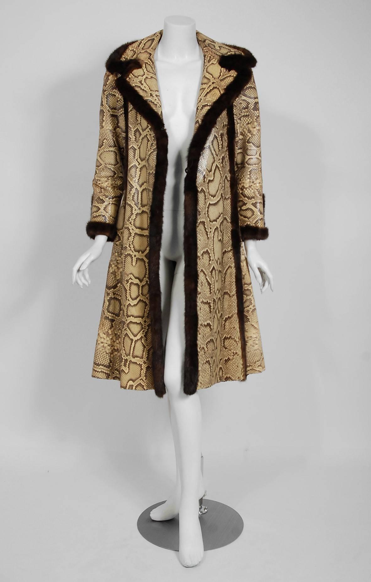 A stunning custom couture 1970's tailored princess coat in the most fabulous genuine python snakeskin and mink fur combination.  I love the dramatic wide portrait-collar and lean, long sleeves. Shaped with princess-line seams that flare out below