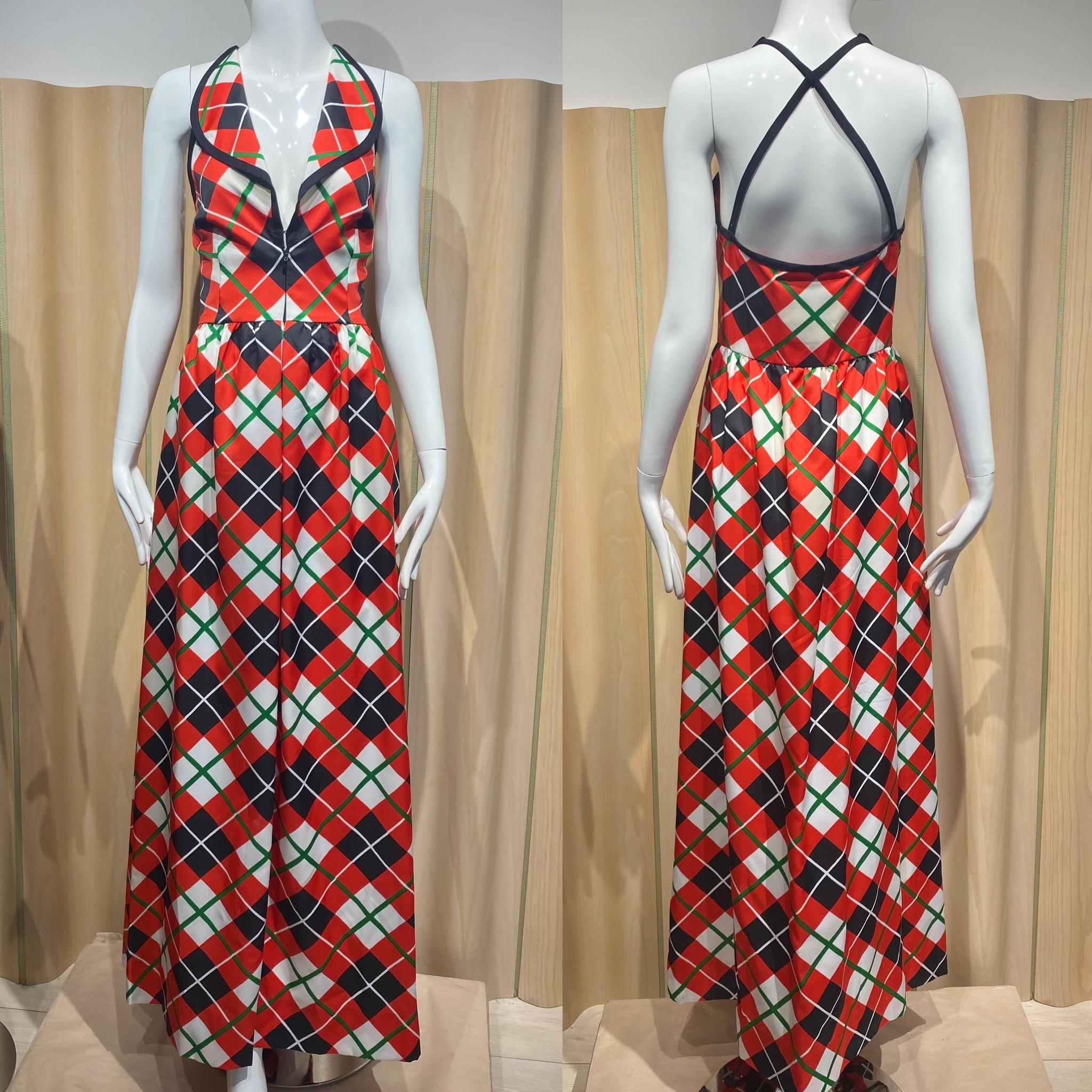 1970s Geoffrey Beene Plaid maxi halter dress in red, black and white. Racer back triangle back. Unique Collar.  
Size Medium
Measurement:
Bust : 38 inches / Waist 29 inches / Hips: 48 inches

* for reference out mannequin is size 4
32” Bust/ 26”