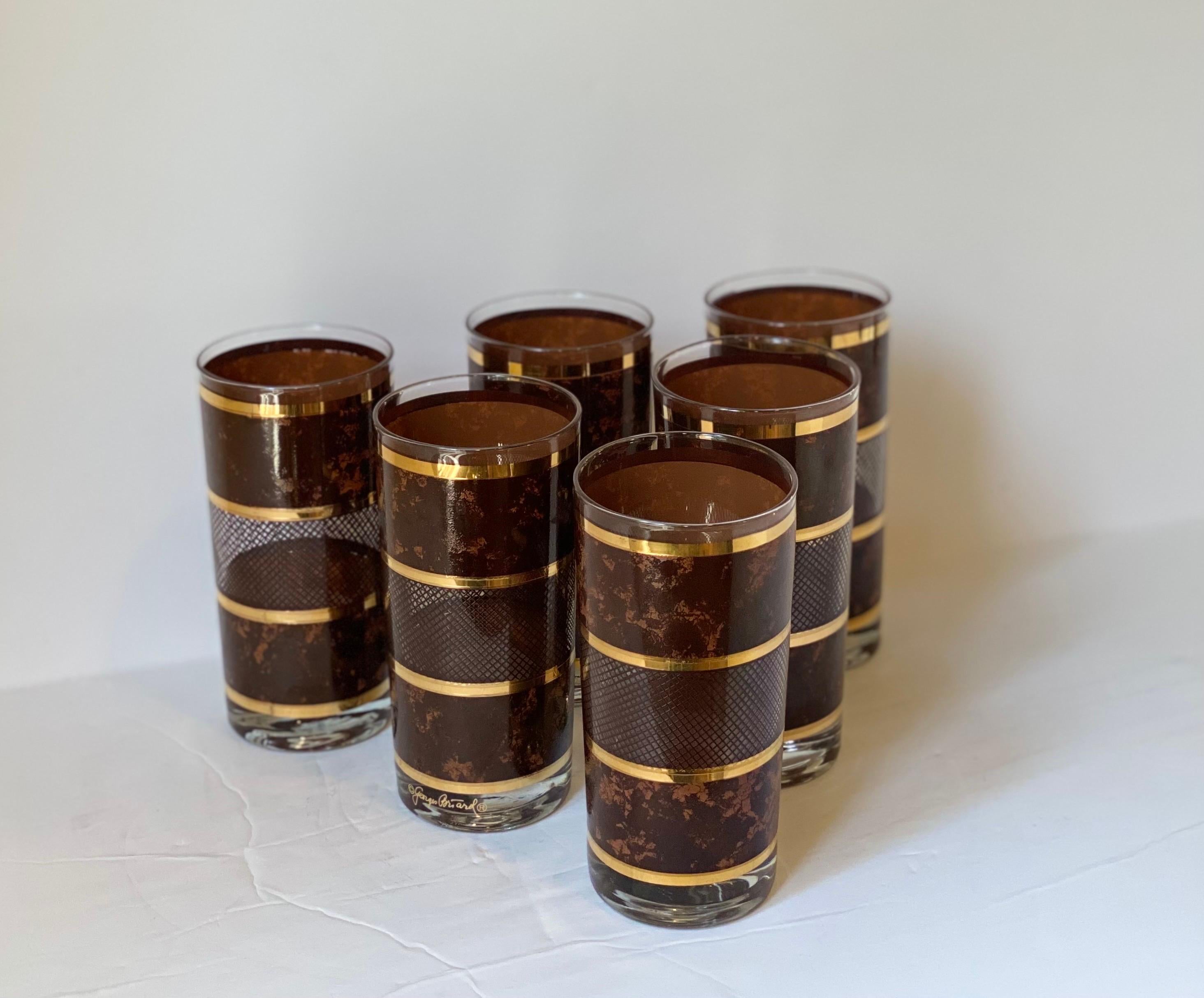 We are very pleased to offer a set of six stunning, handmade colored glasses by American award-winning designer Georges Briard, circa the 1970s. He is renowned for his beautiful dishware and glassware, his signature collections were stocked at