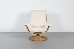 1970s Gerard van den Berg Rattan Swivel Chair, High Back, Canvas Cushion