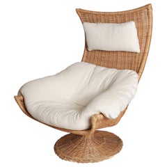 1970s Gerard van den Berg Rattan Swivel Lounge Chair for Montis