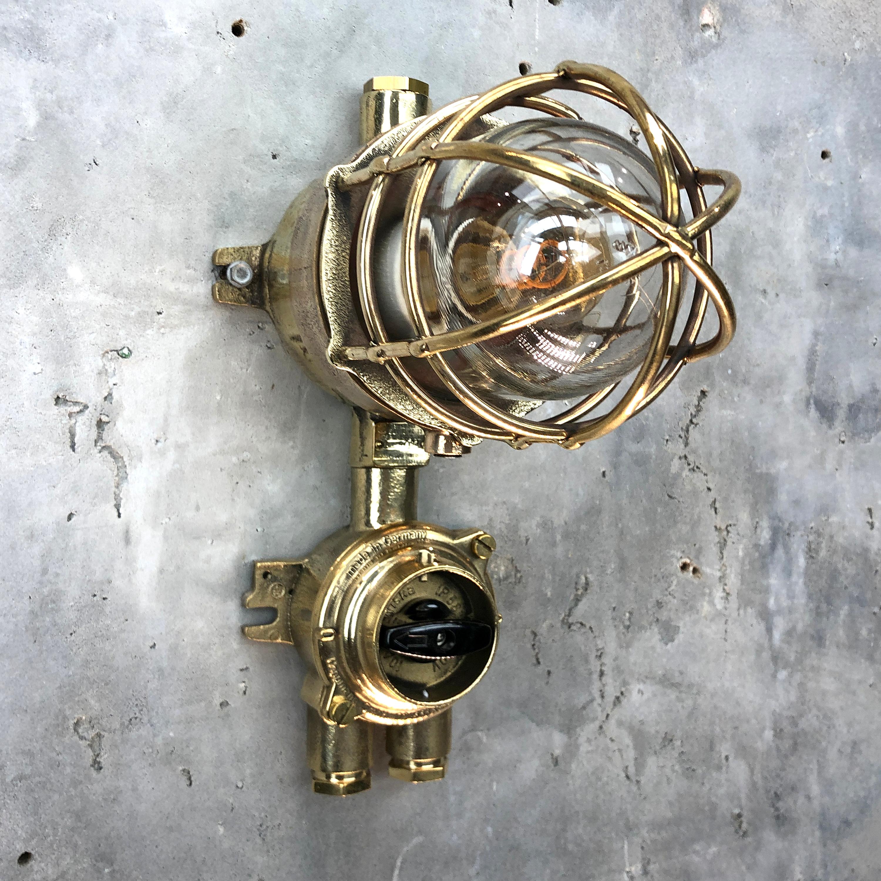A vintage Industrial solid cast bronze and brass explosion proof pendant manufactured circa 1975 by Wiska and Centurion who are manufacturers of Ex. (explosion proof) rated fixtures. 

The lamp comes fitted with a cast brass Wiska isolator