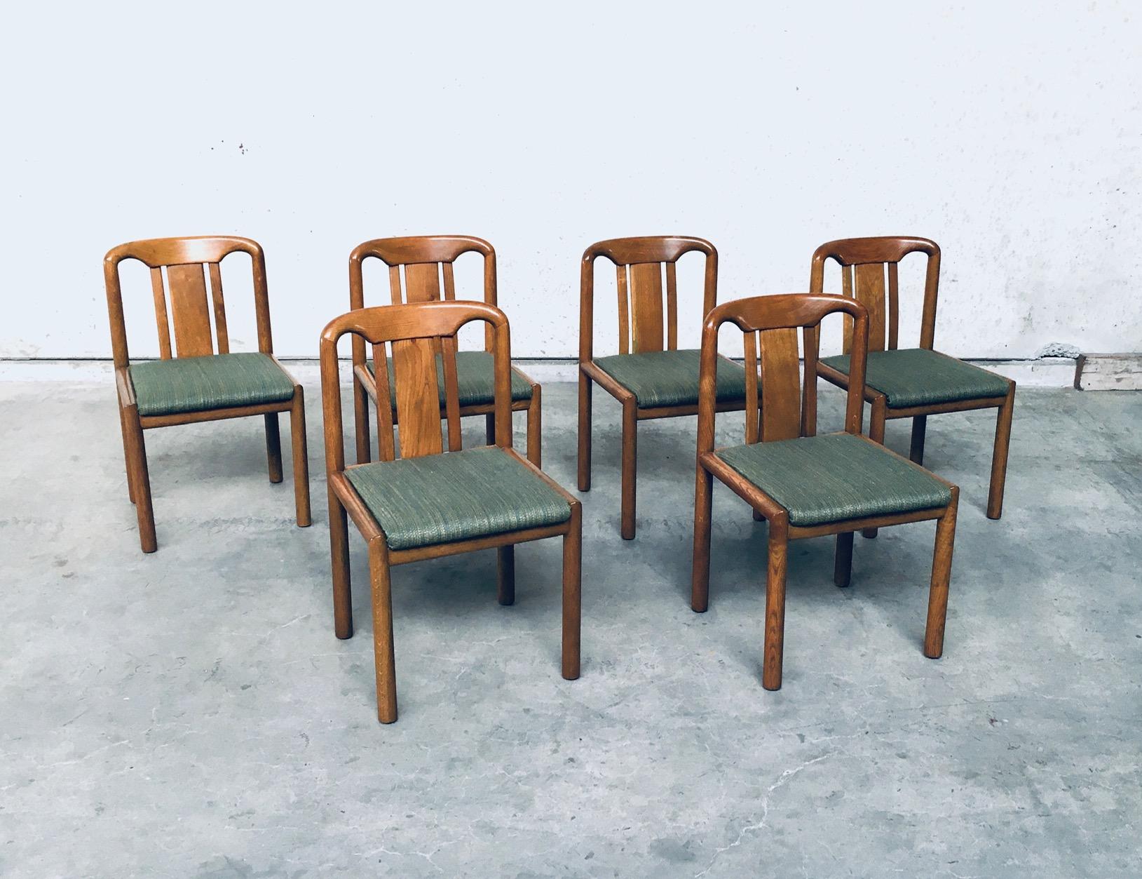 Vintage Mid-Century Modern German design set of 6 dining chairs in oak with green woven fabric seat. Made in Germany, in the 1970's. Well made sturdy design. Rounded oak frame with formed back. Labeled, but no maker name. All chairs come in very
