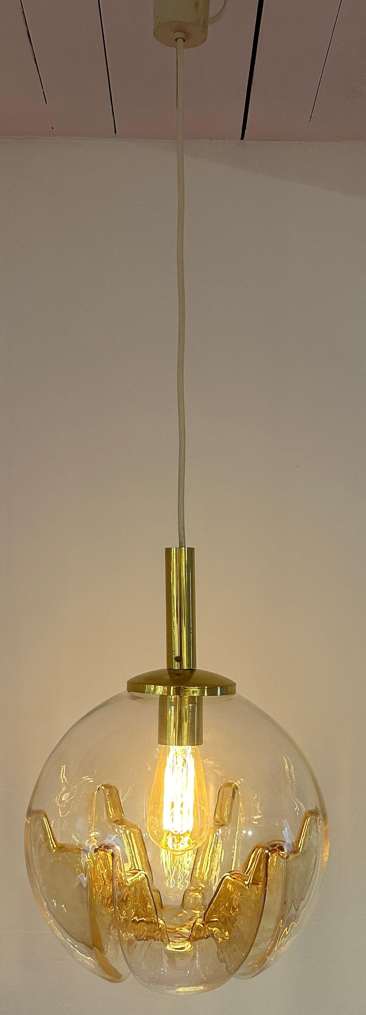 1970s German Doria Leuchten Amber Glass Globe & Brass Ceiling Hanging Light In Good Condition In London, England