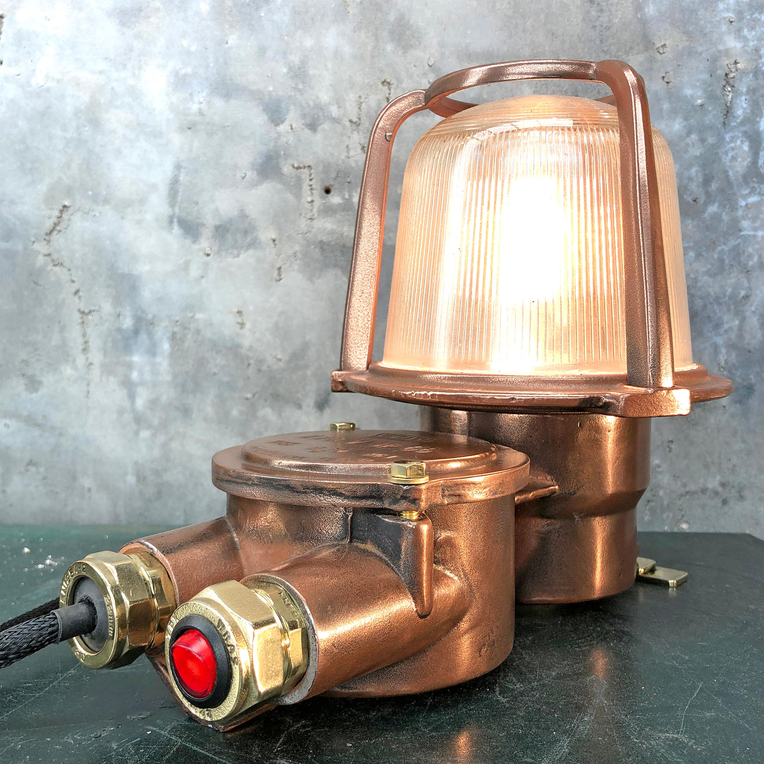 This is an authentic industrial table lamp converted from an old EOW copper and brass bulkhead lamp.

Originating from German sea going vessels built during the 1970s these lights were fitted outdoors and are fully water proof with an IP66