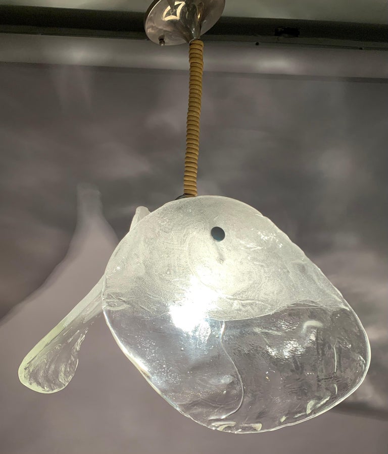 1970s German Murano glass hanging pendant light manufactured by Fischer Leuchten. The three thick glass petals are secured onto the chrome metal frame with a single chrome screw which fits through a hole in the top of the glass. The thick iced glass