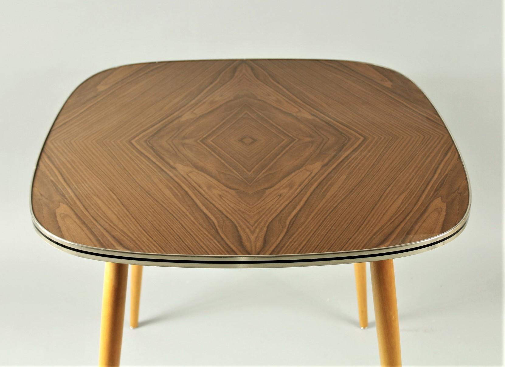 German coffee or side table with formica table top from the 1960s.