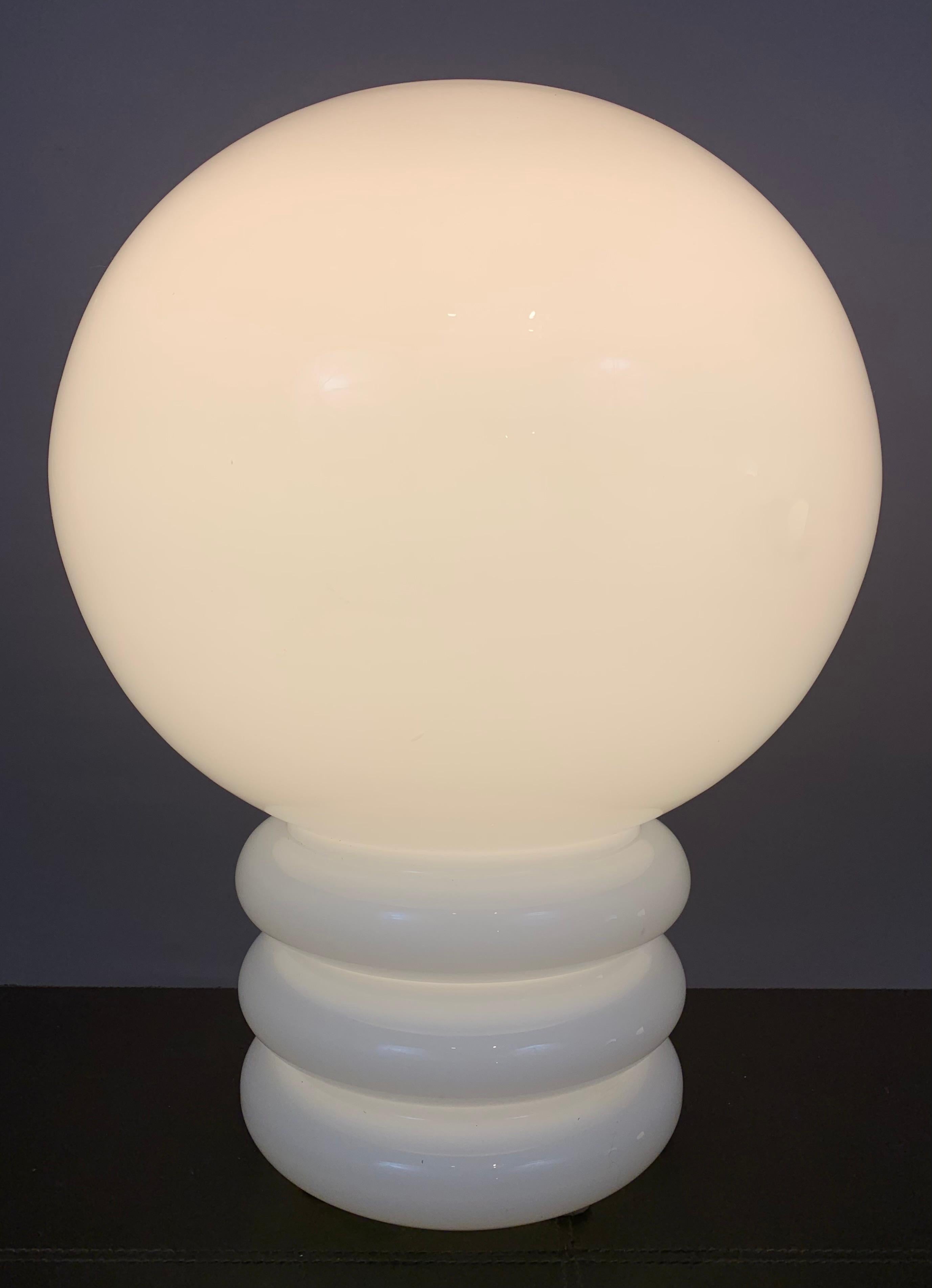 1970s Large German Glashütte Limburg space age white glass table lamp. Stilnovo style. A wonderful statement lamp which is in very good vintage condition. The metal stem which holds the bayonet bulb holder has been replaced because the original one