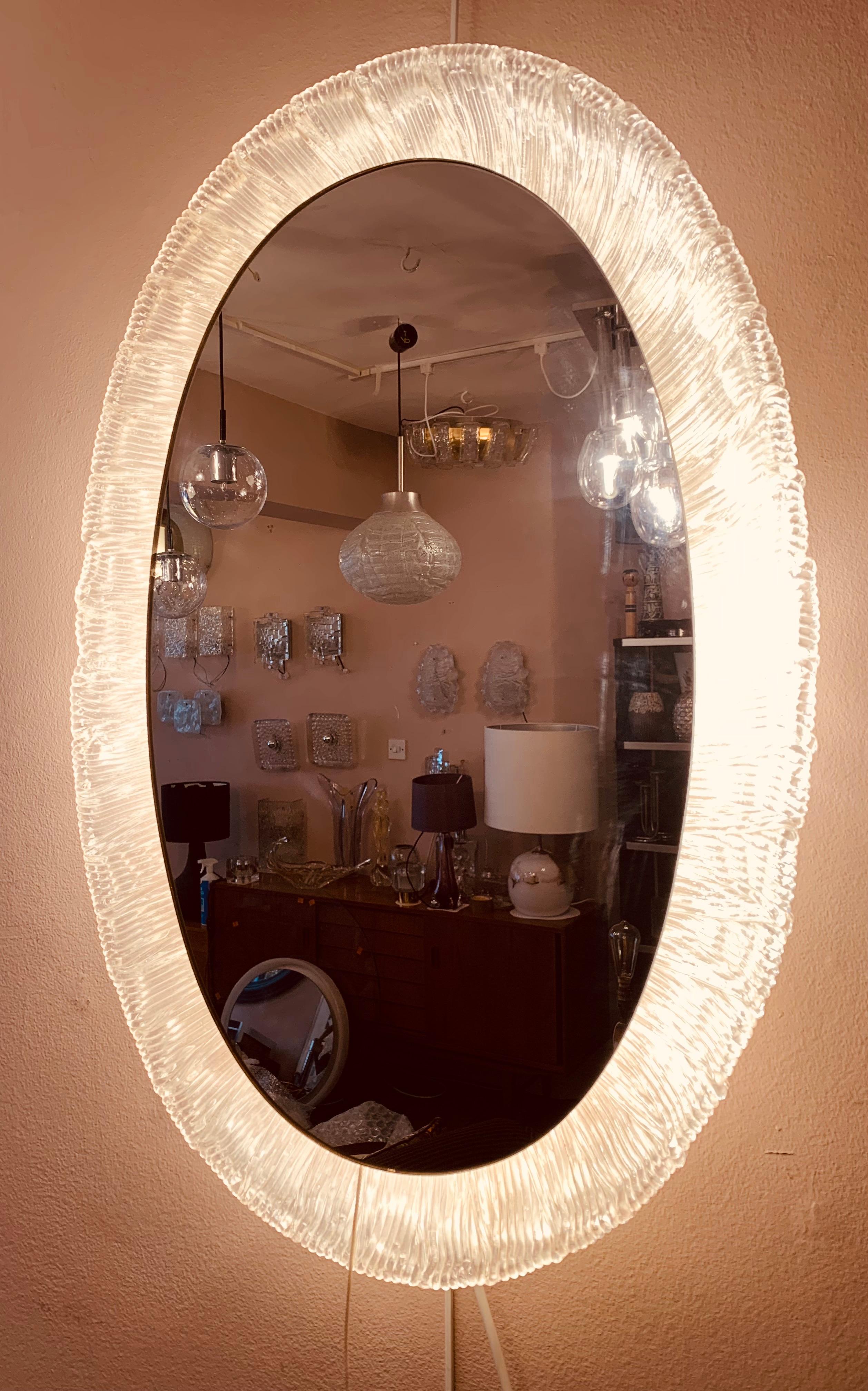 backlit framed mirror