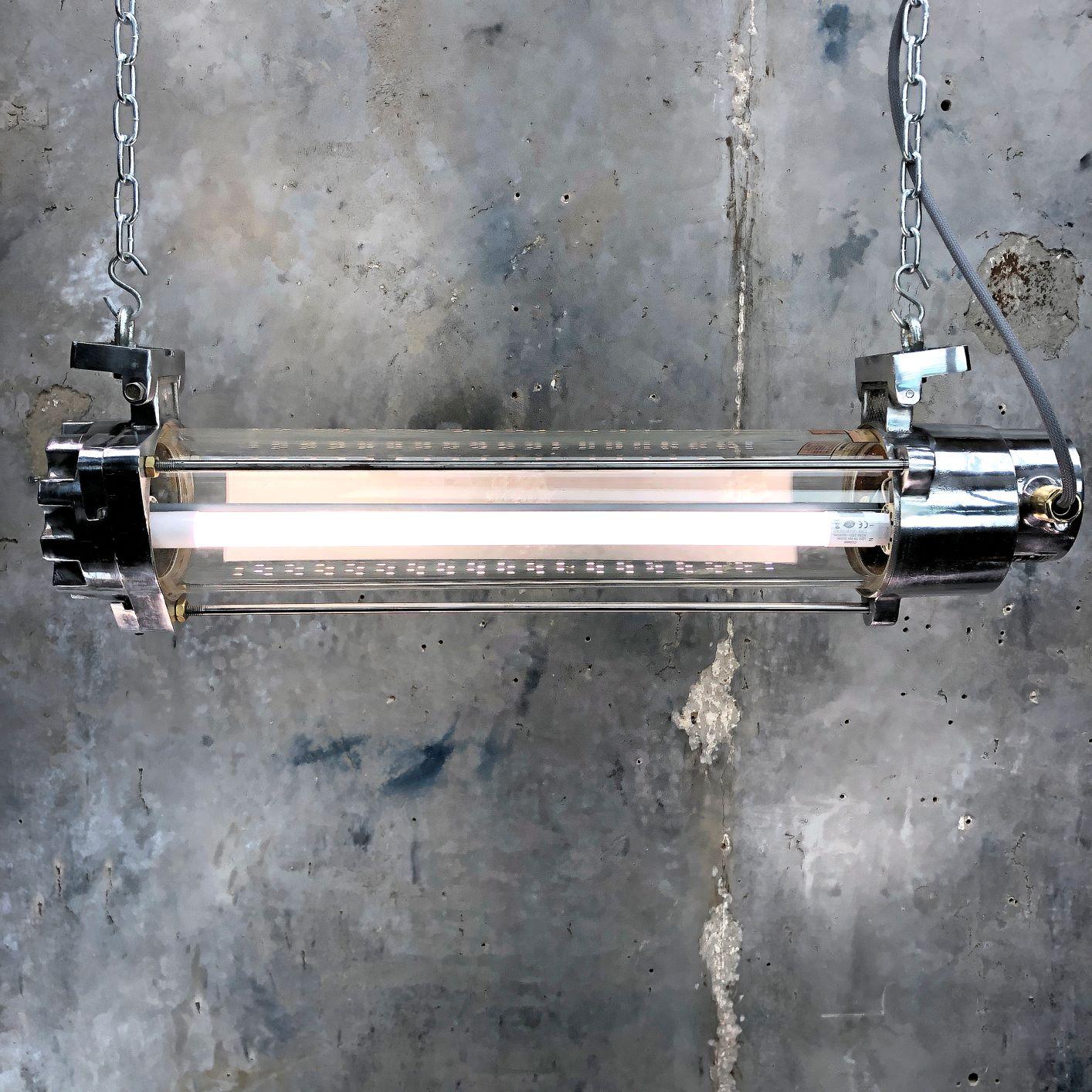 A retro Industrial aluminum German explosion proof ceiling striplight by Leuchtenbau Wittenberg. Reclaimed from supertankers and military vessels, then professionally stripped and refinished in the UK by Loomlight ready for modern interiors.

This