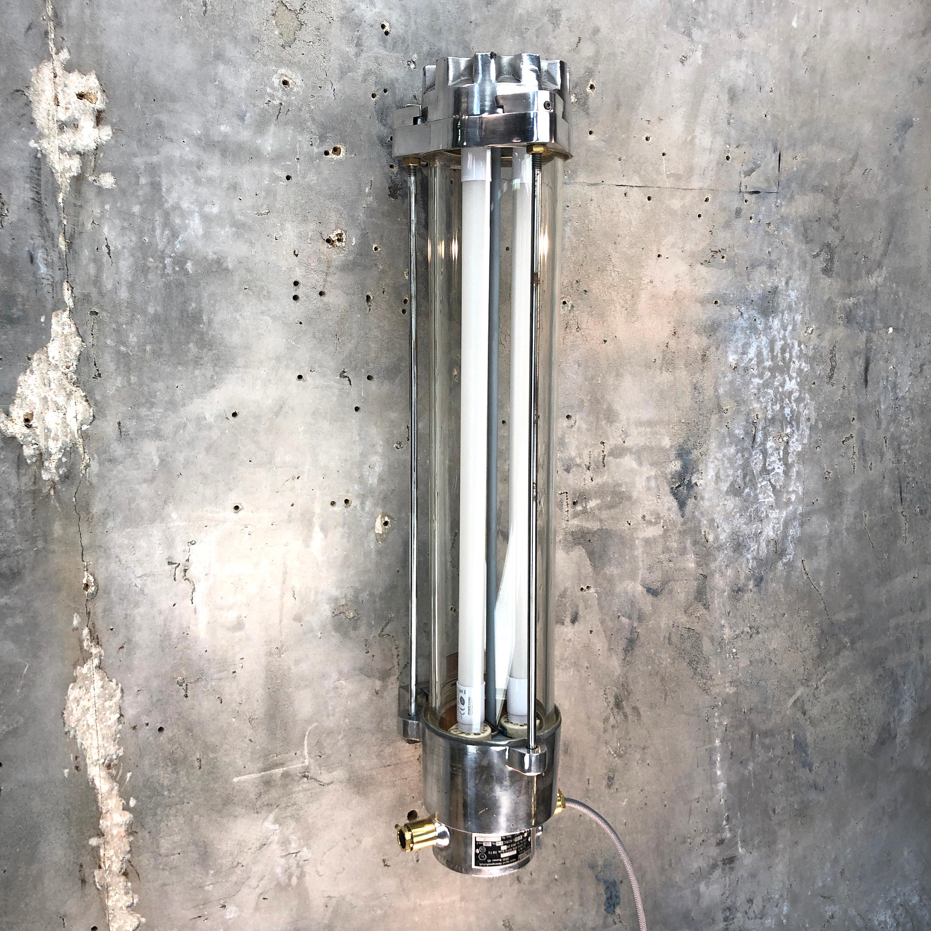 A retro industrial aluminium wall-mounted German explosion proof striplight by Wittenberg. Reclaimed from supertankers and military vessels then professionally stripped and refinished in the UK by Loomlight.

This fixture is supplied with a 12