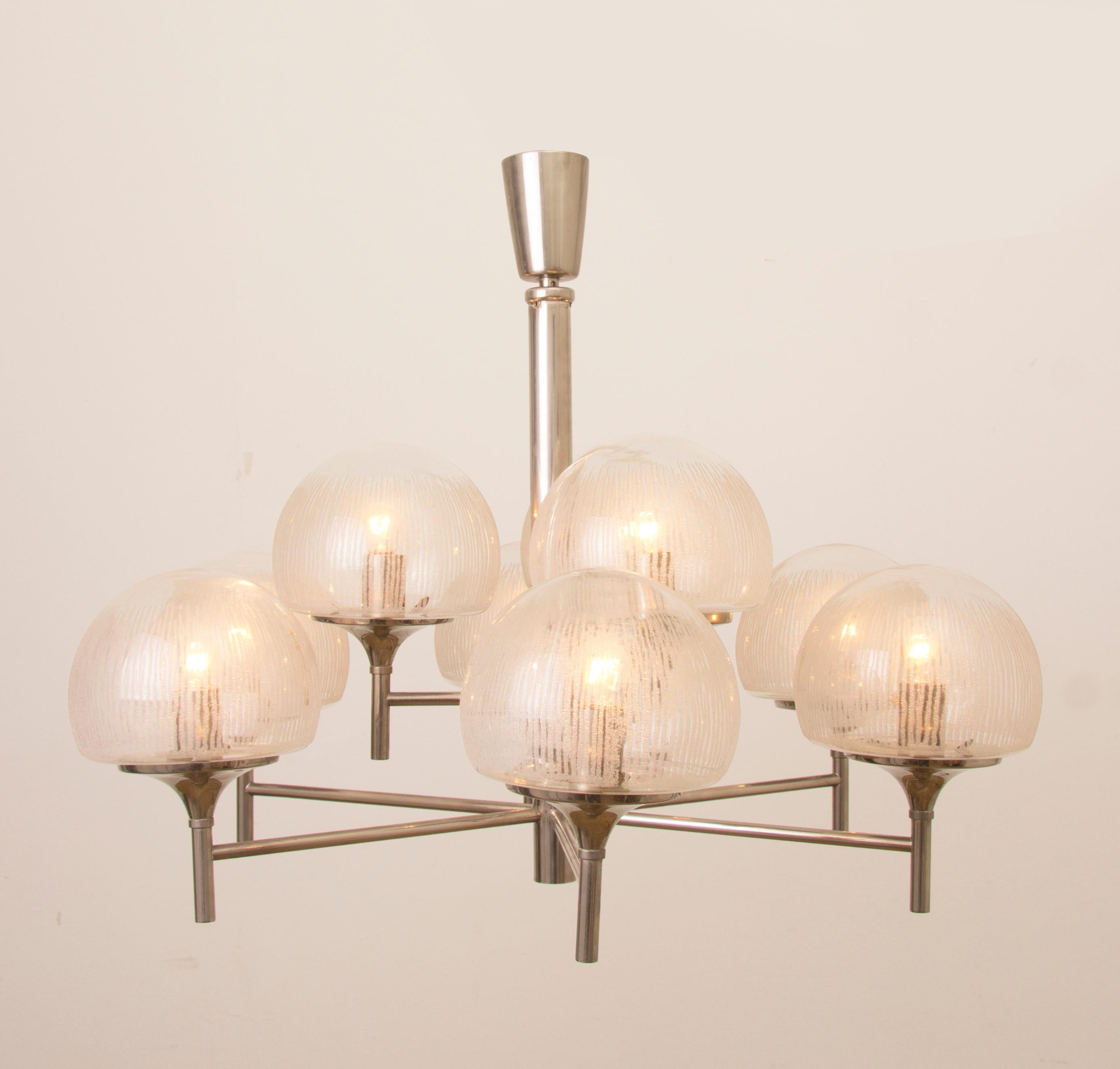 1970s large German Kaiser Leuchten chrome and 9 globe pendant light. The two-tiered light comprises of 6 frosted semi-hemispheric glass globes around the lower tier and three above suspended from polished chrome arms. The globes are held in place