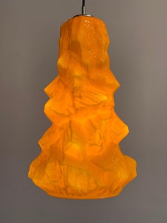 1970s German Peill & Putzler Glacial Orange & White Cast Glass Pendant Light