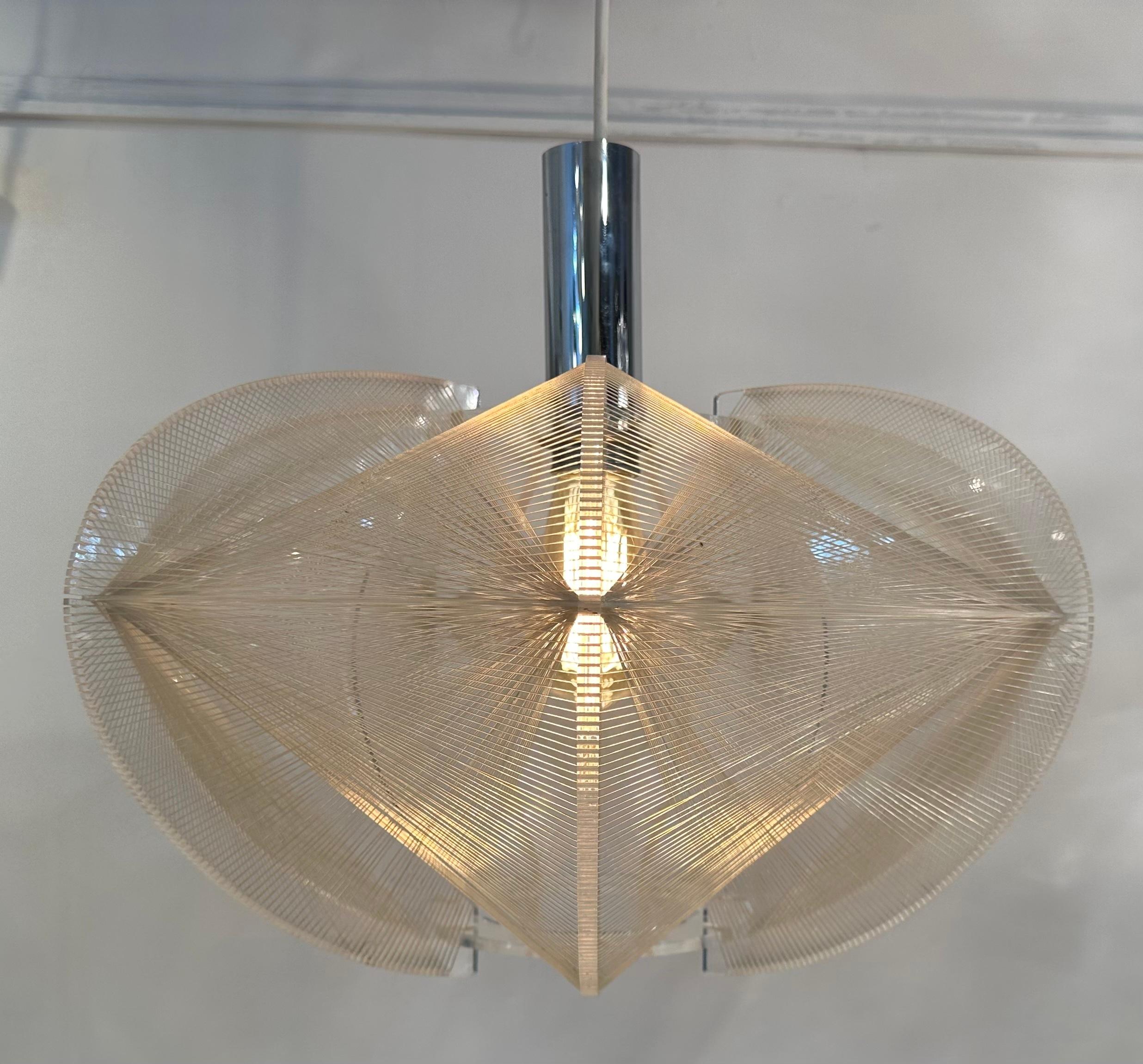 1970s German space age nylon, perspex and chrome 'fishing line' pendant, hanging, ceiling light. Manufactured by Sompex and designed by French designer Paul Secon. The light is very cleverly constructed with a perspex frame with nylon threads strung