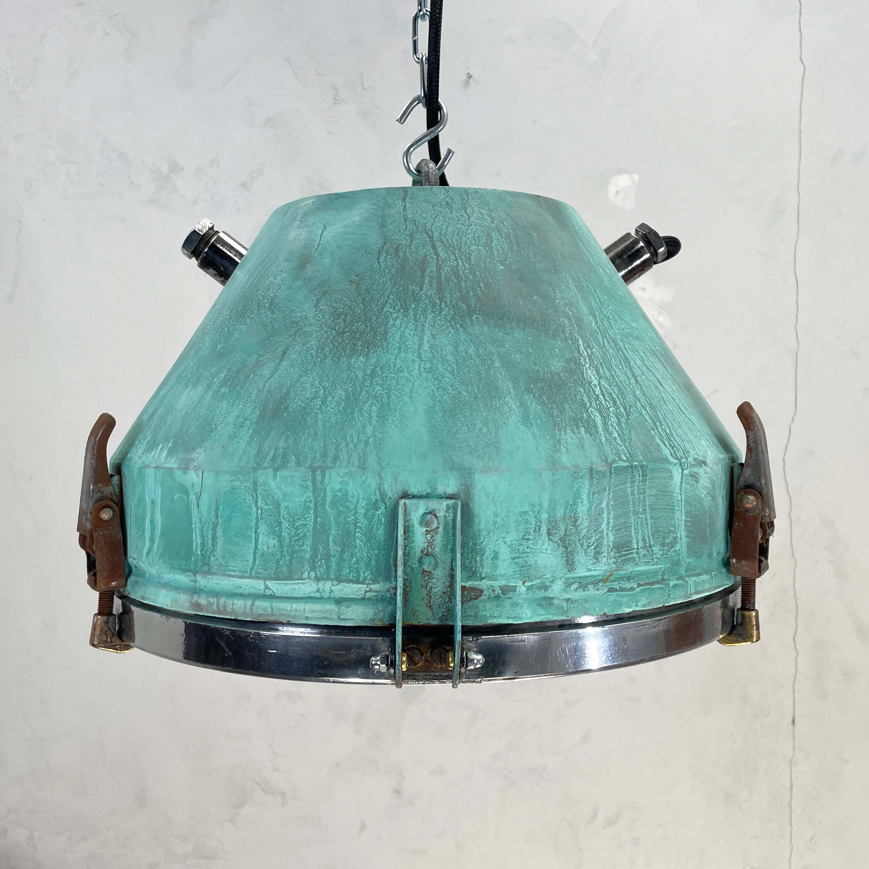 A verdigris industrial ceiling light with glass cover by VEB of Germany manufactured mid century. Professionally restored by hand in UK by Loomlight to modern lighting standards for contemporary interiors. 

The verdigris is applied using our