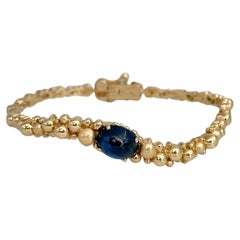 Gilbert Albert anni '70 in oro 18 carati con motivo a bolla di zaffiro e bracciale con cerniera