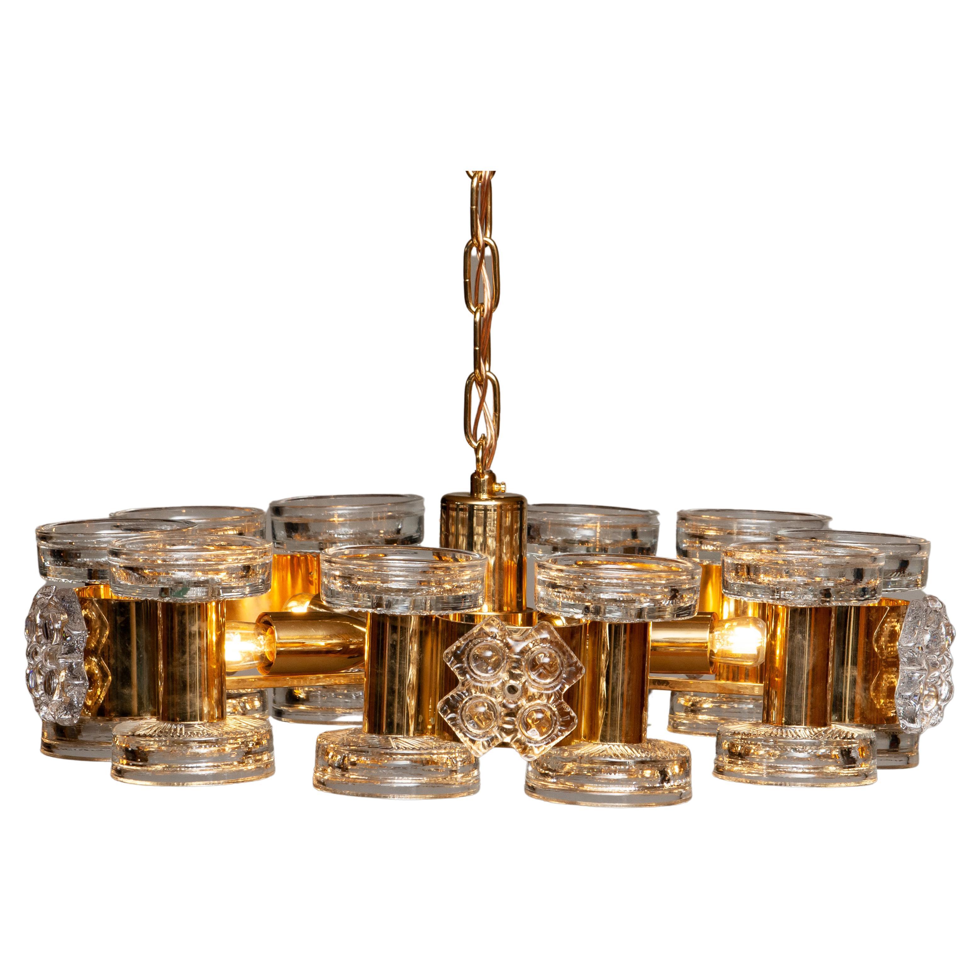 1970s Gilt Chandelier with Ten Candle Holders and Five Screw Bulbs by Orrefors For Sale