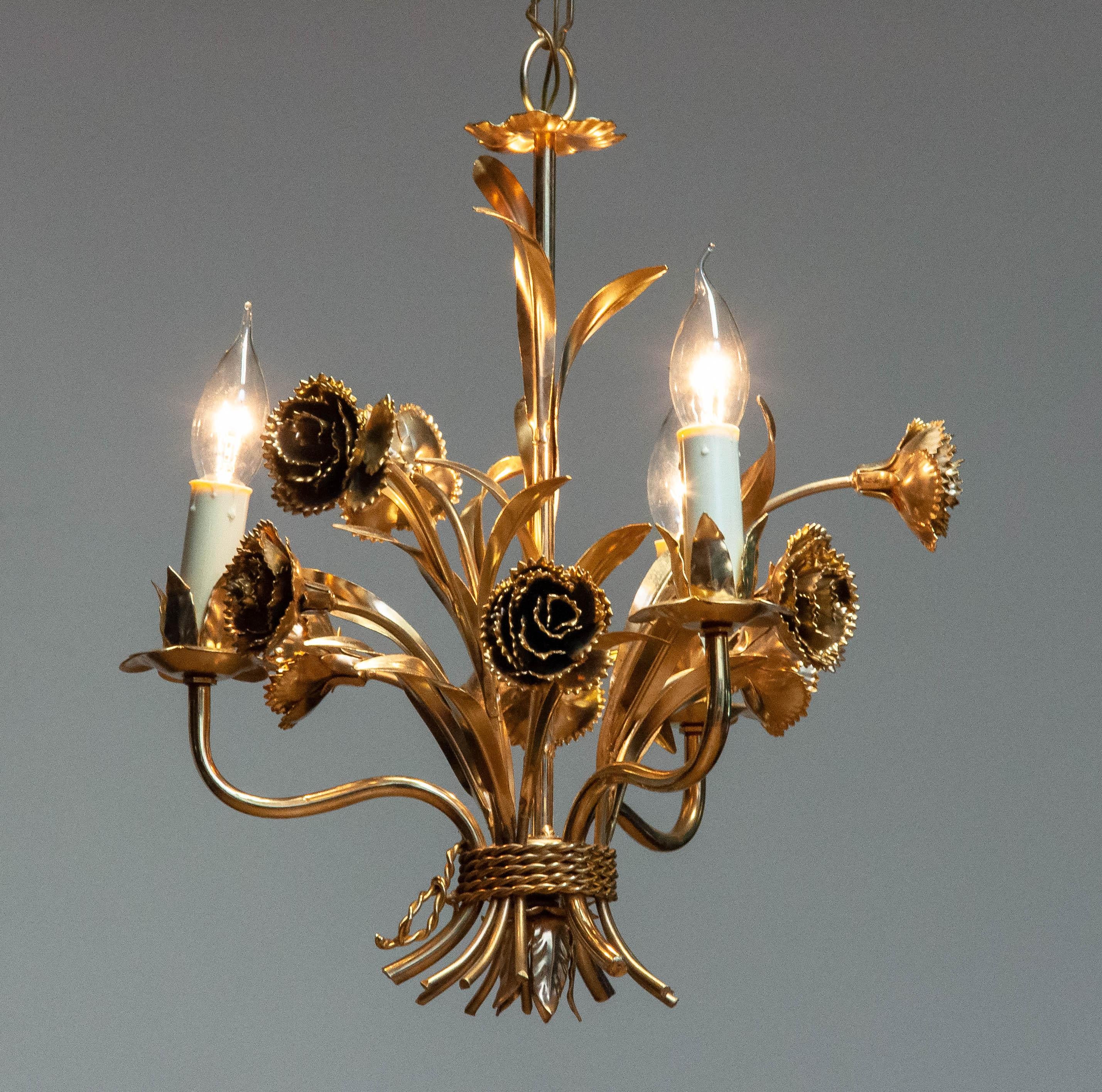 Beautiful chandelier with floral decor in the famous Coco Chanel style made in Germany in the 1960s by Hans Kogl.
The chandelier is gilded.
Technically 100% and overall in very good condition. Three E14 screw fittings.
Length of the chain is: 50cm /