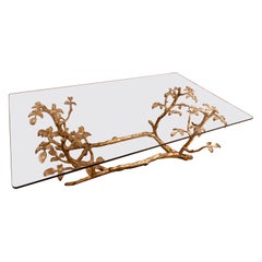 1970s Gilt-bronze Coffee Table with Leaves and Branches and a Glass Top.