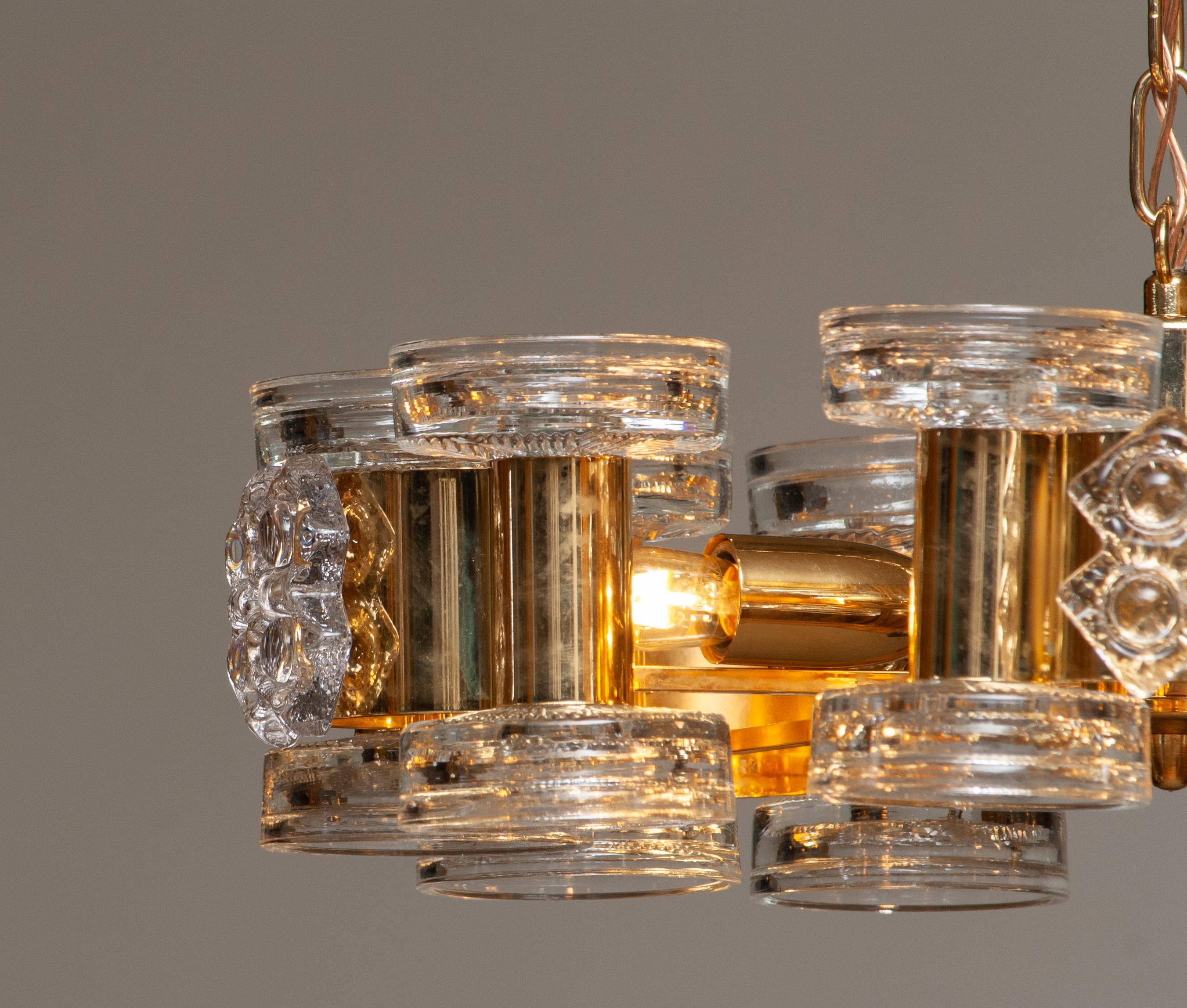 Swedish 1970s Gilt Chandelier with  Candle Holders and  Screw Bulbs by Orrefors For Sale