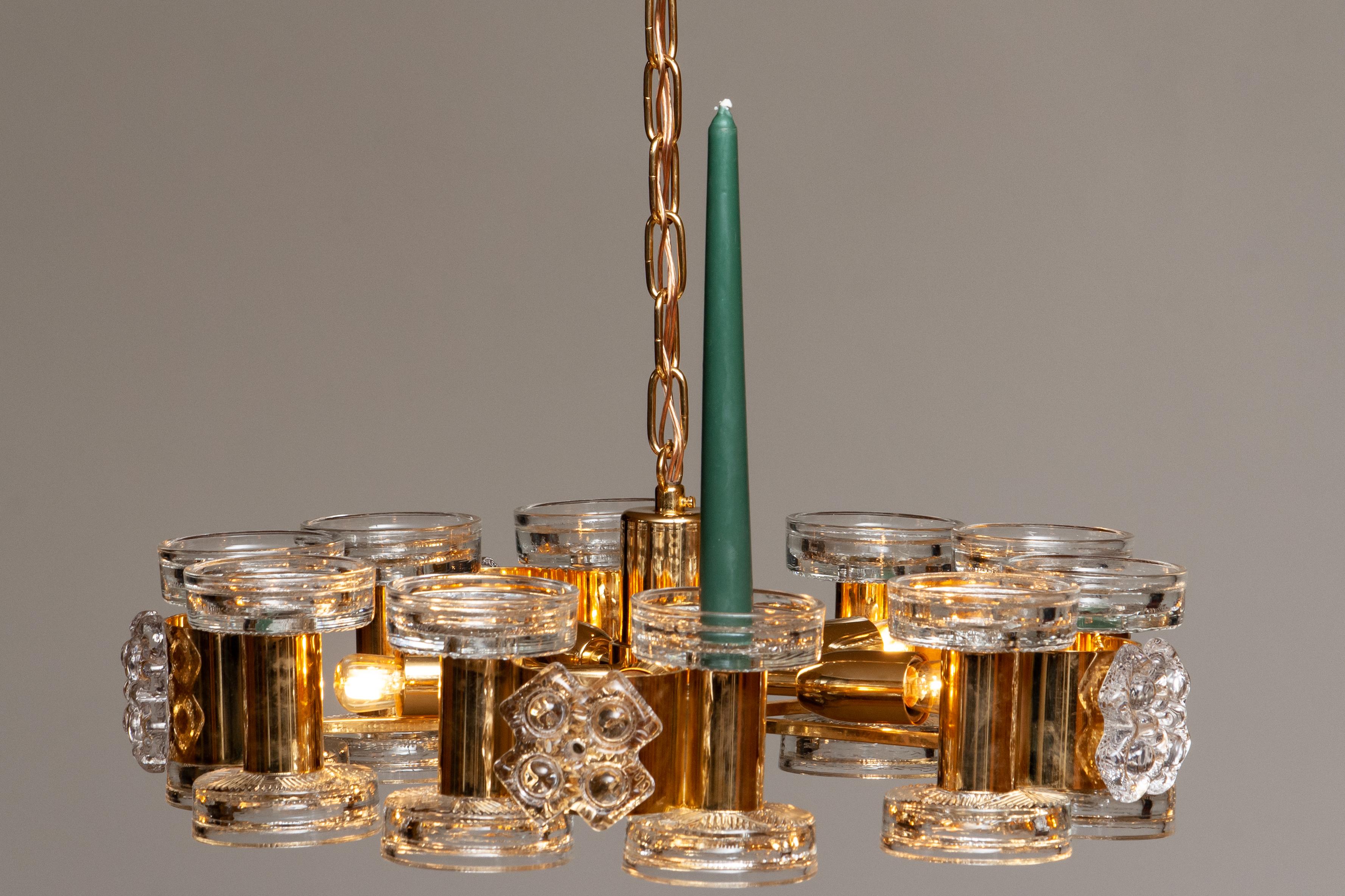 Brass 1970s Gilt Chandelier with  Candle Holders and  Screw Bulbs by Orrefors For Sale