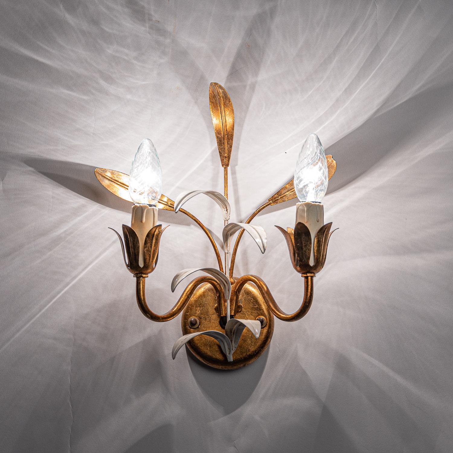 Iconic gilt metal white and gold colored leaf lighting with two Edison (E14) fittings.
 