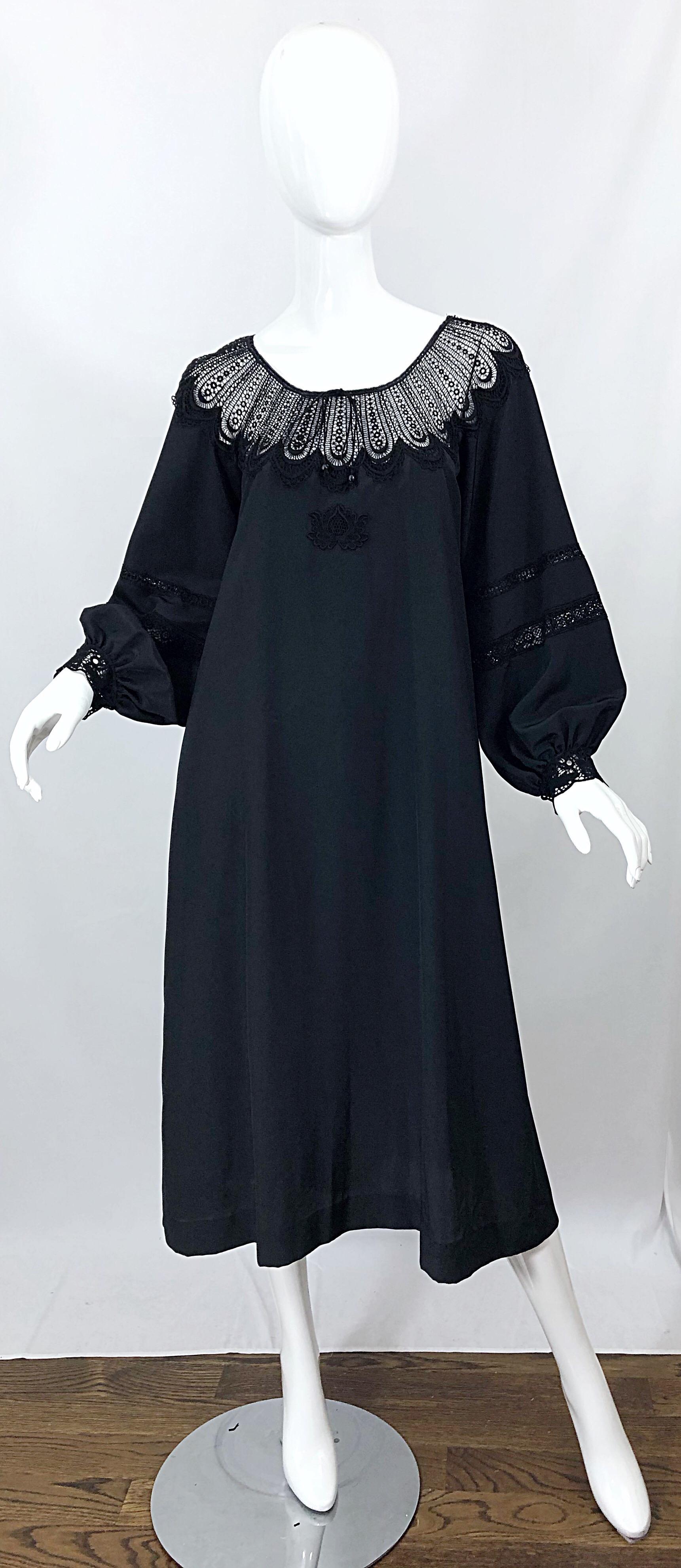 Chic 70s GIORGIO DI SANT ANGELO black crochet bishop sleeve smock dress! Features cut-out crochet detail at neck and mid arm. Adjustable ties at center front neck. Simply slips over the head. Great belted or alone. The pictured vintage Paloma