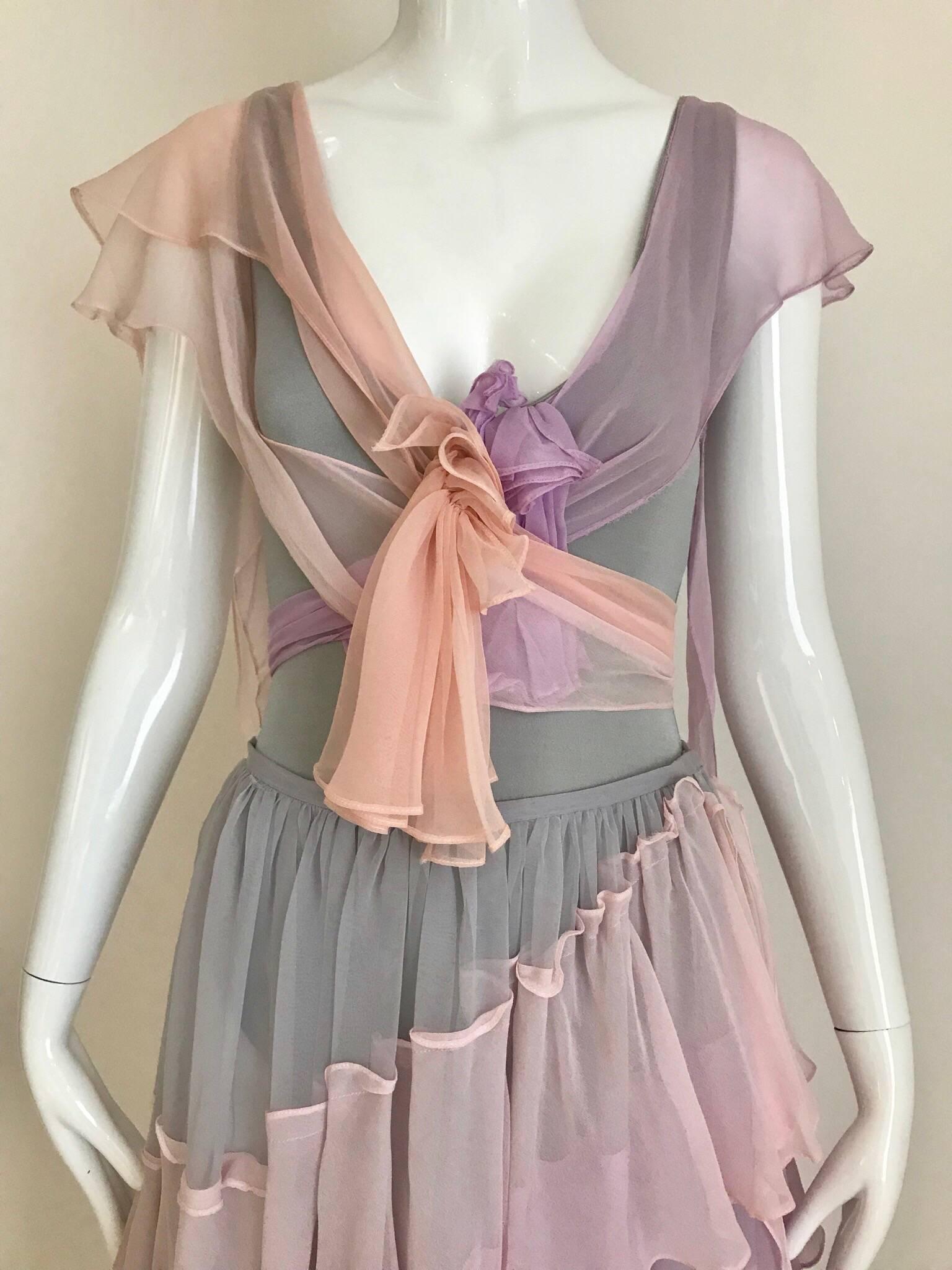 Romantic and sexy vintage Giorgio sant'angelo pastel pink and lavender lycra and crepe ruffly body suit and skirt set.  ( snap on body suit)  Size: Small - Medium