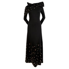 1970's GIVENCHY black wool dress with large gold studs